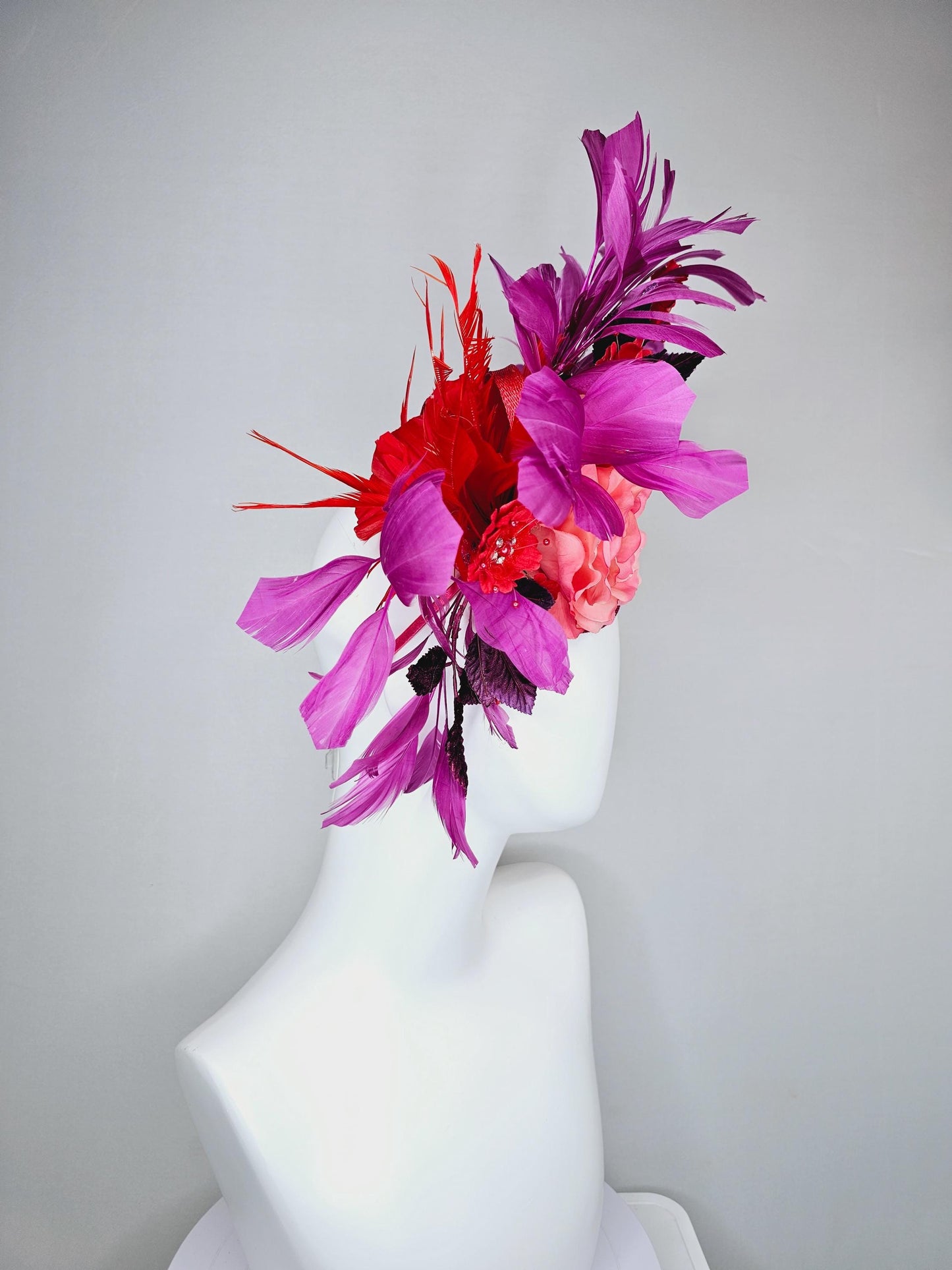 kentucky derby hat fascinator pink ombre satin rose, scarlet red satin flowers, purple leaves, magenta purple branching feathers