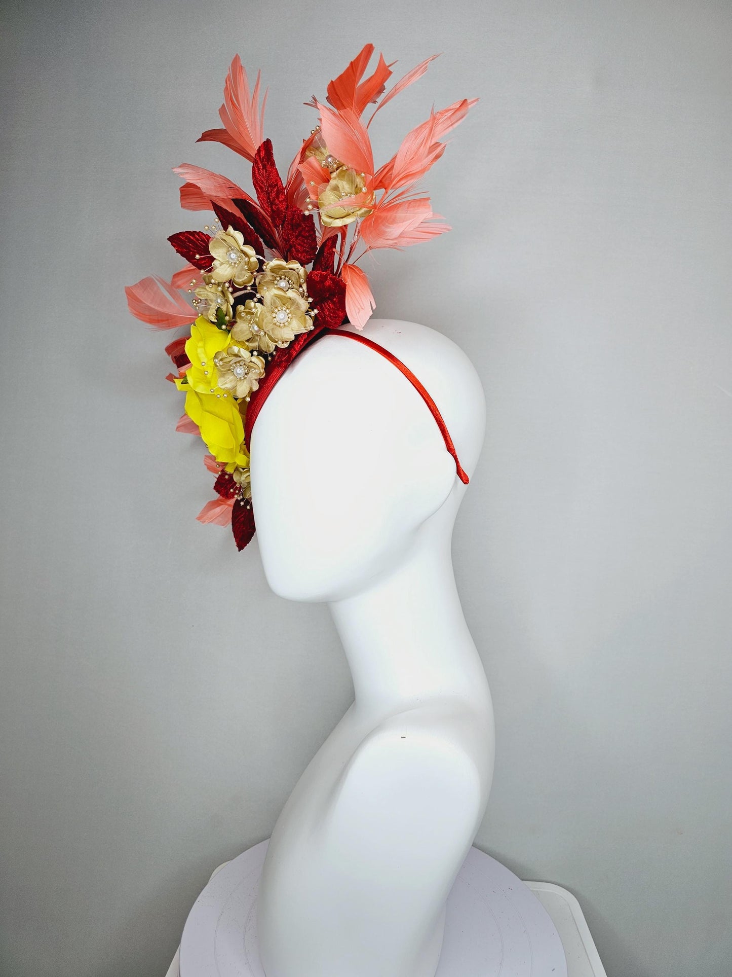 kentucky derby hat fascinator yellow satin roses,gold tan beige satin flowers with pearls,scarlet red leaves,coral orange branching feathers