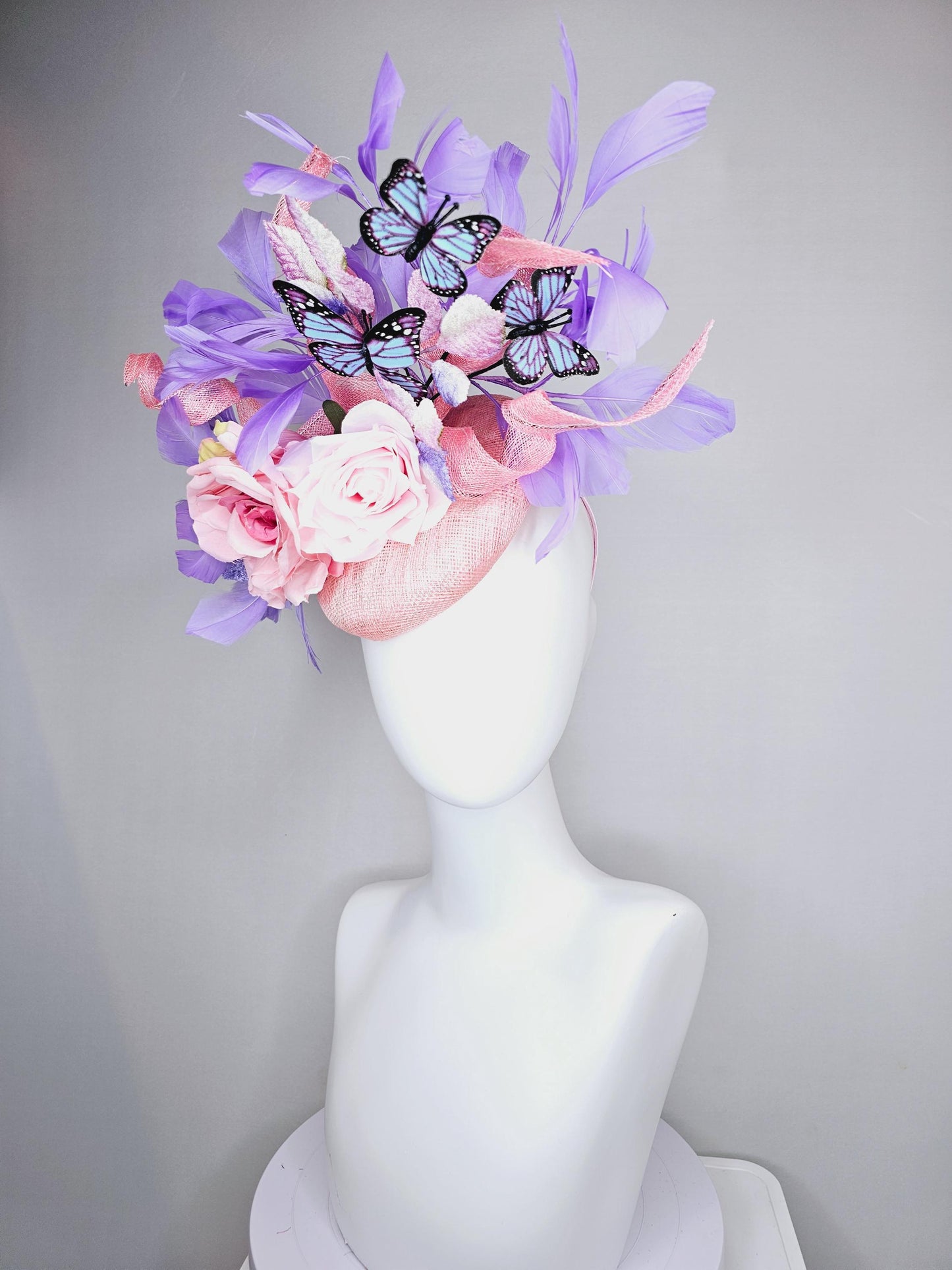 kentucky derby hat fascinator blush pink sinamay w/curls,light pink satin roses,pink purple leaves,lavender purple feathers,blue butterflies