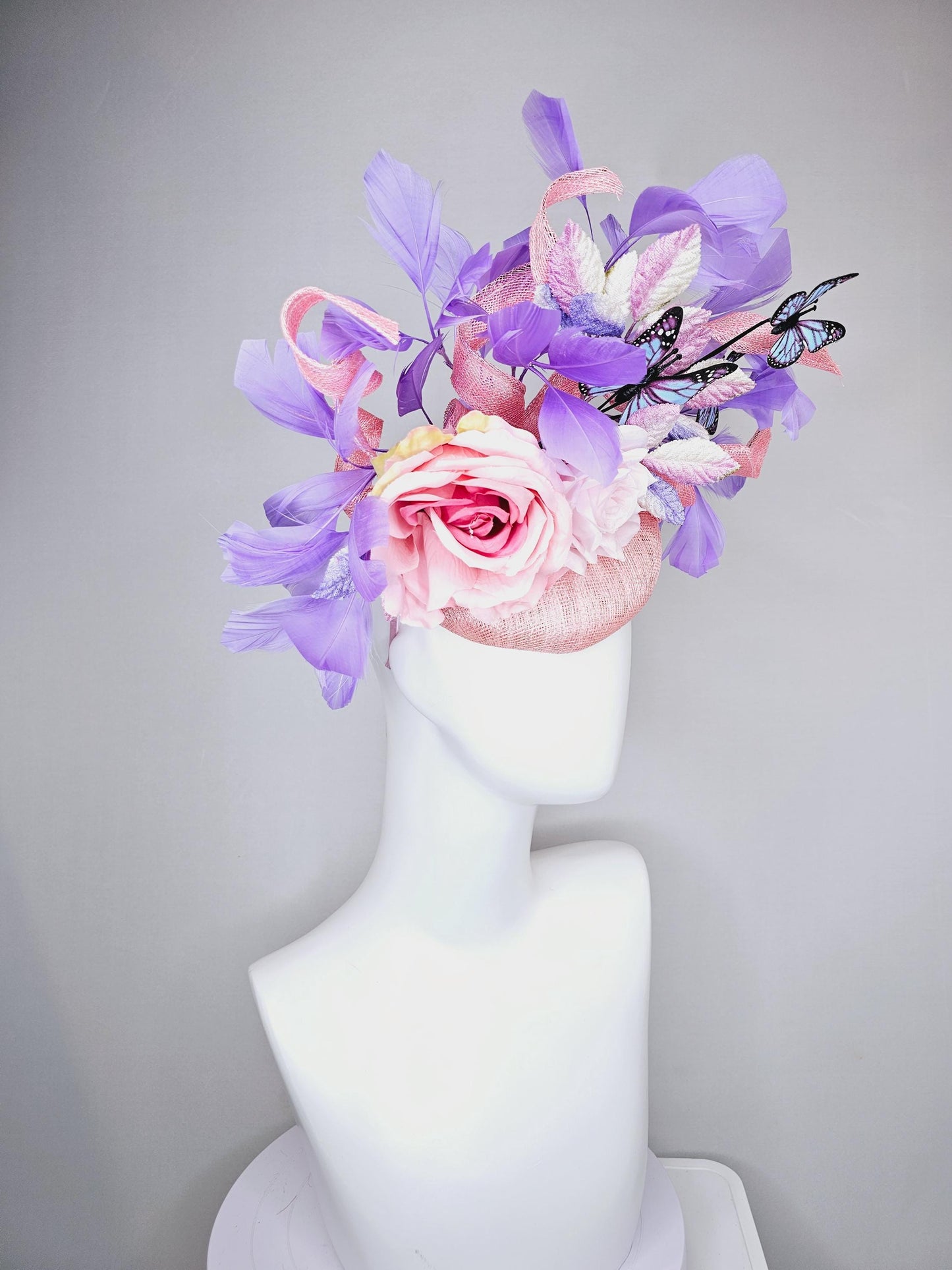 kentucky derby hat fascinator blush pink sinamay w/curls,light pink satin roses,pink purple leaves,lavender purple feathers,blue butterflies