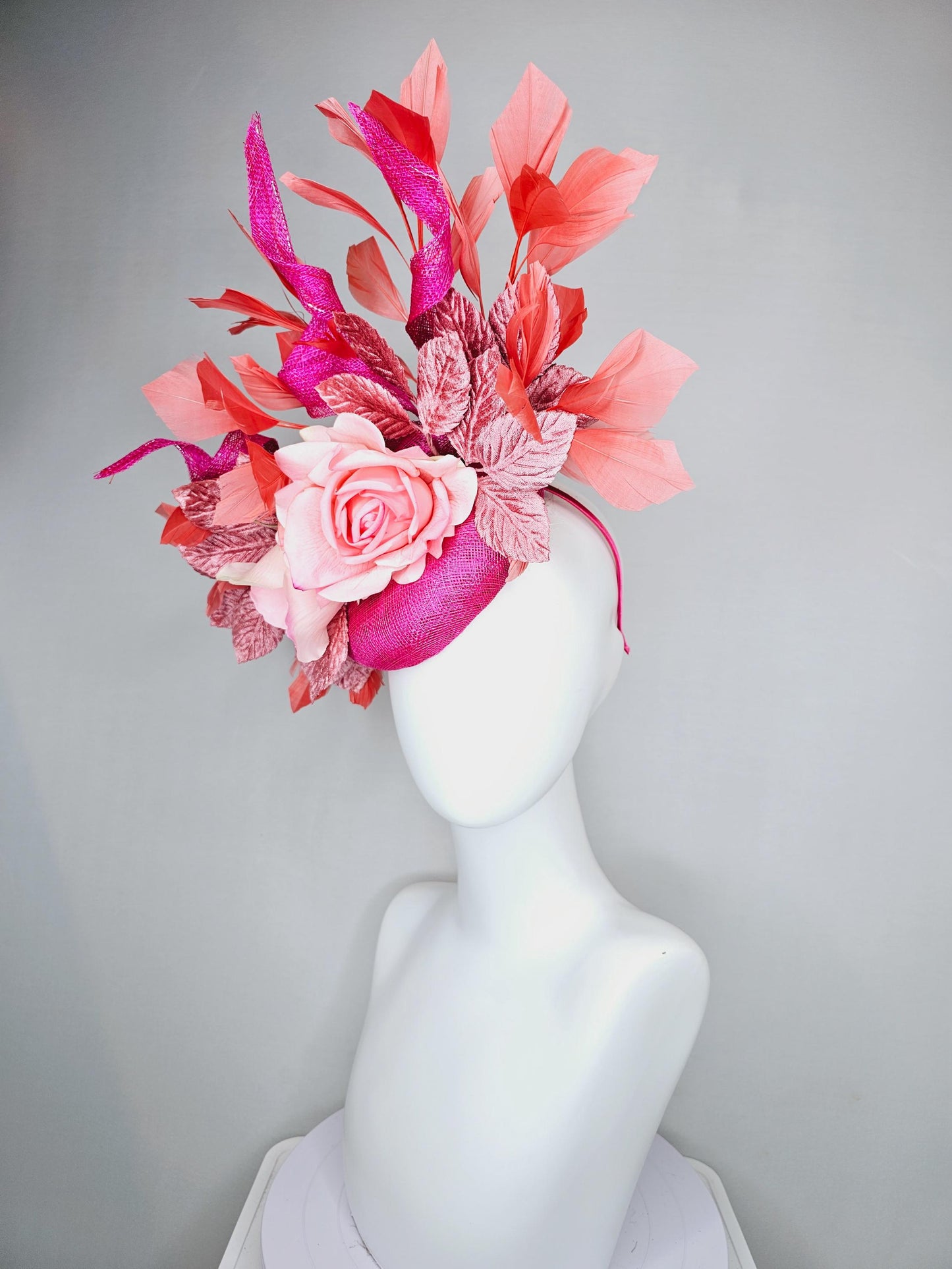 kentucky derby hat fascinator fuchsia pink sinamay with curls, light pink satin roses, dusty pink leaves, coral orange branching feathers