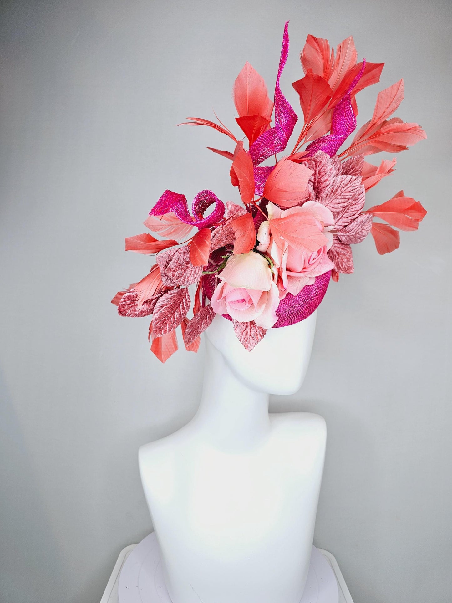 kentucky derby hat fascinator fuchsia pink sinamay with curls, light pink satin roses, dusty pink leaves, coral orange branching feathers