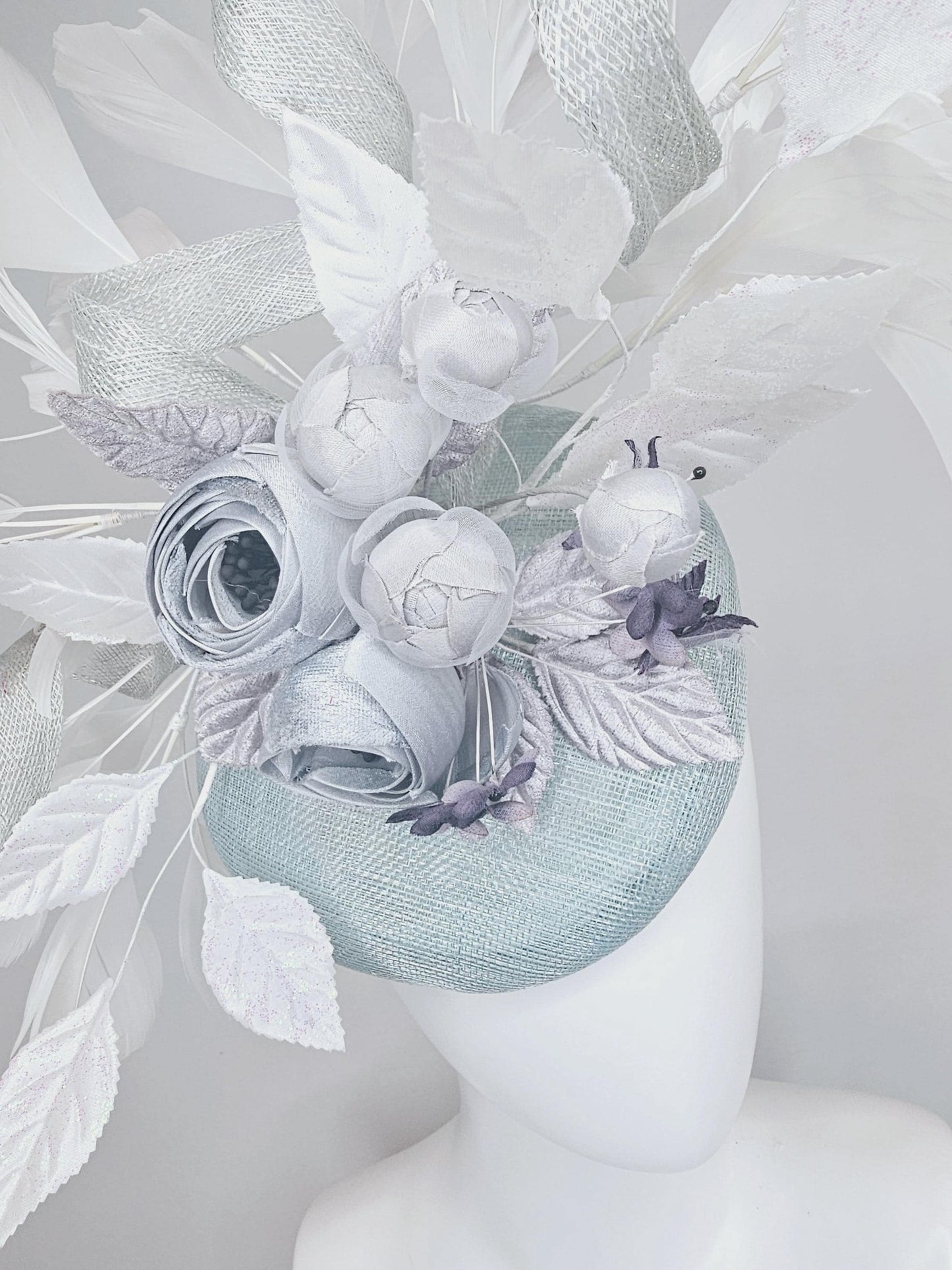 kentucky derby hat fascinator light blue sinamay with curls, silver light gray purple ombre satin flowers white silver leaves,white feathers