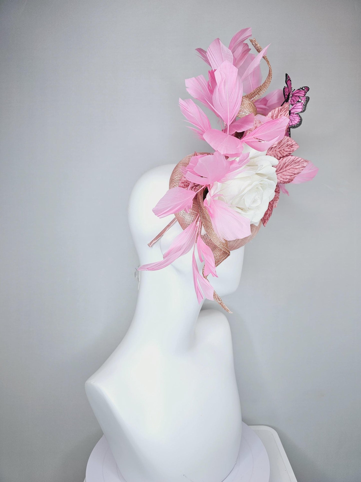 kentucky derby hat fascinator blush pink sinamay w/ curls,ivory white satin rose,light rose pink leaves,pink feathers,pink black butterflies