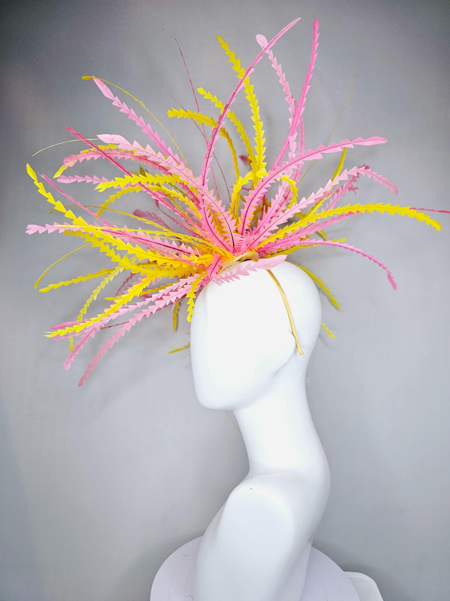 kentucky derby hat fascinator huge light pink and bright yellow zigzag feather headpiece
