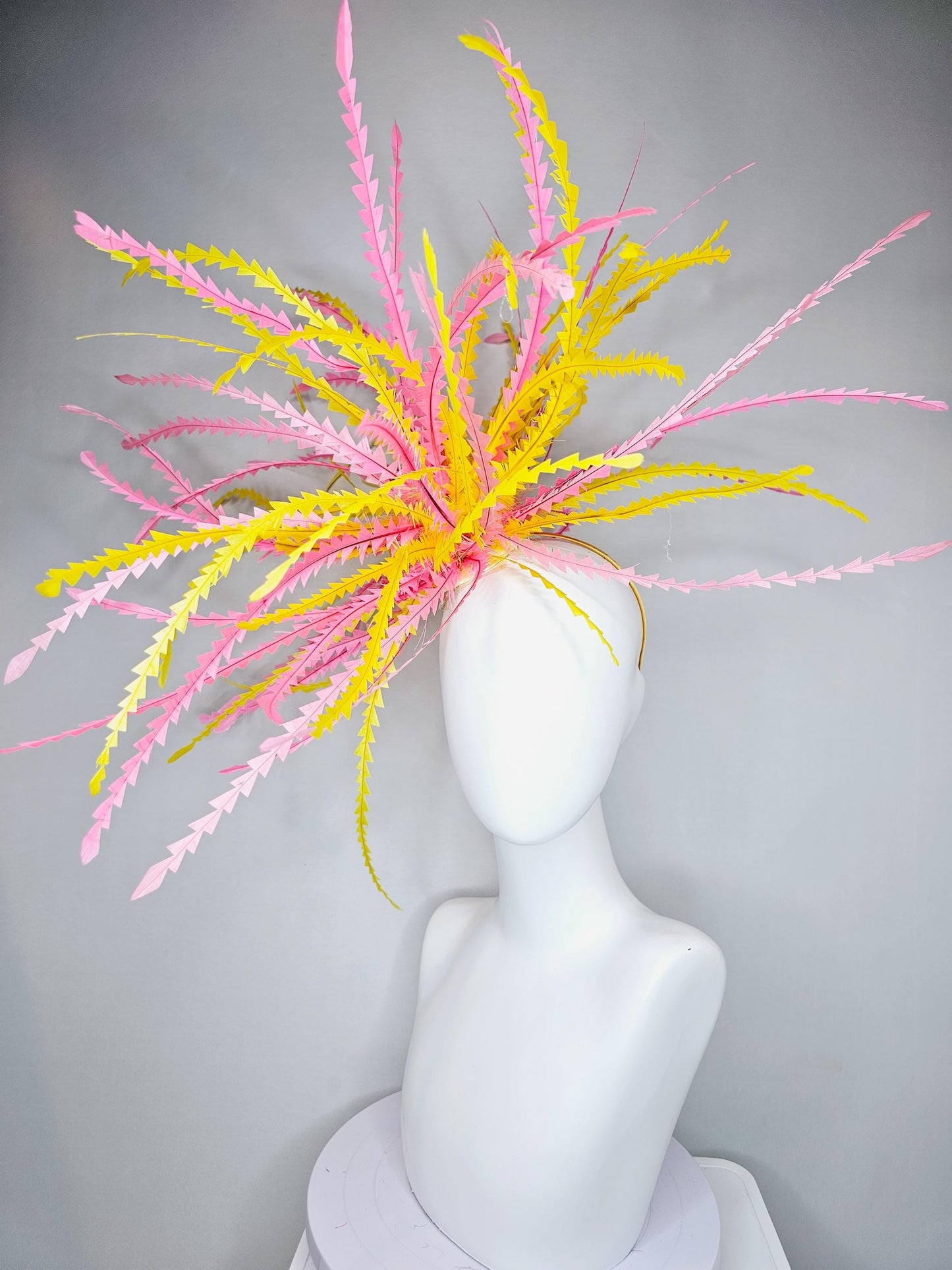 kentucky derby hat fascinator huge light pink and bright yellow zigzag feather headpiece