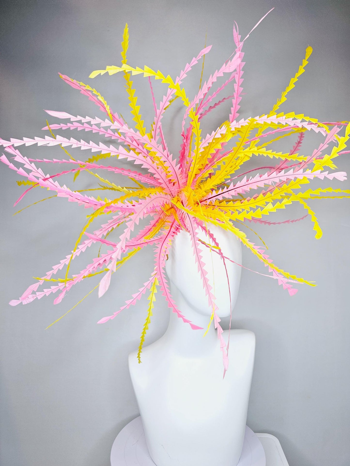 kentucky derby hat fascinator huge light pink and bright yellow zigzag feather headpiece
