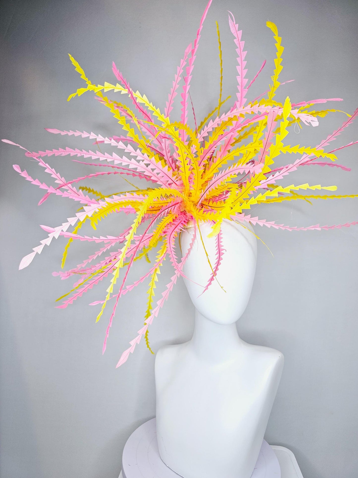 kentucky derby hat fascinator huge light pink and bright yellow zigzag feather headpiece