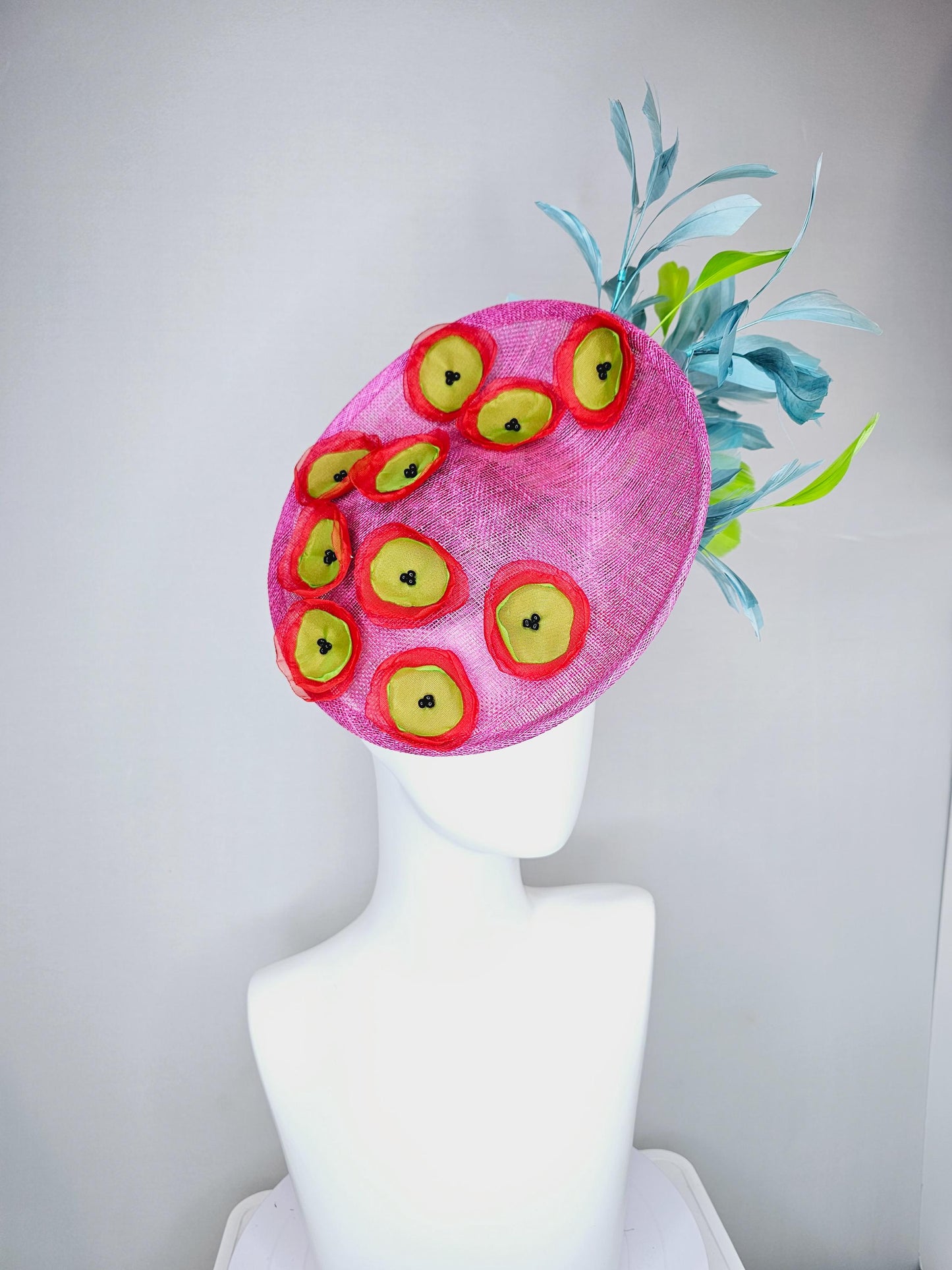 kentucky derby hat fascinator hot pink saucer with red green organza embroidered flowers,lime yellow green and sky blue branching feathers