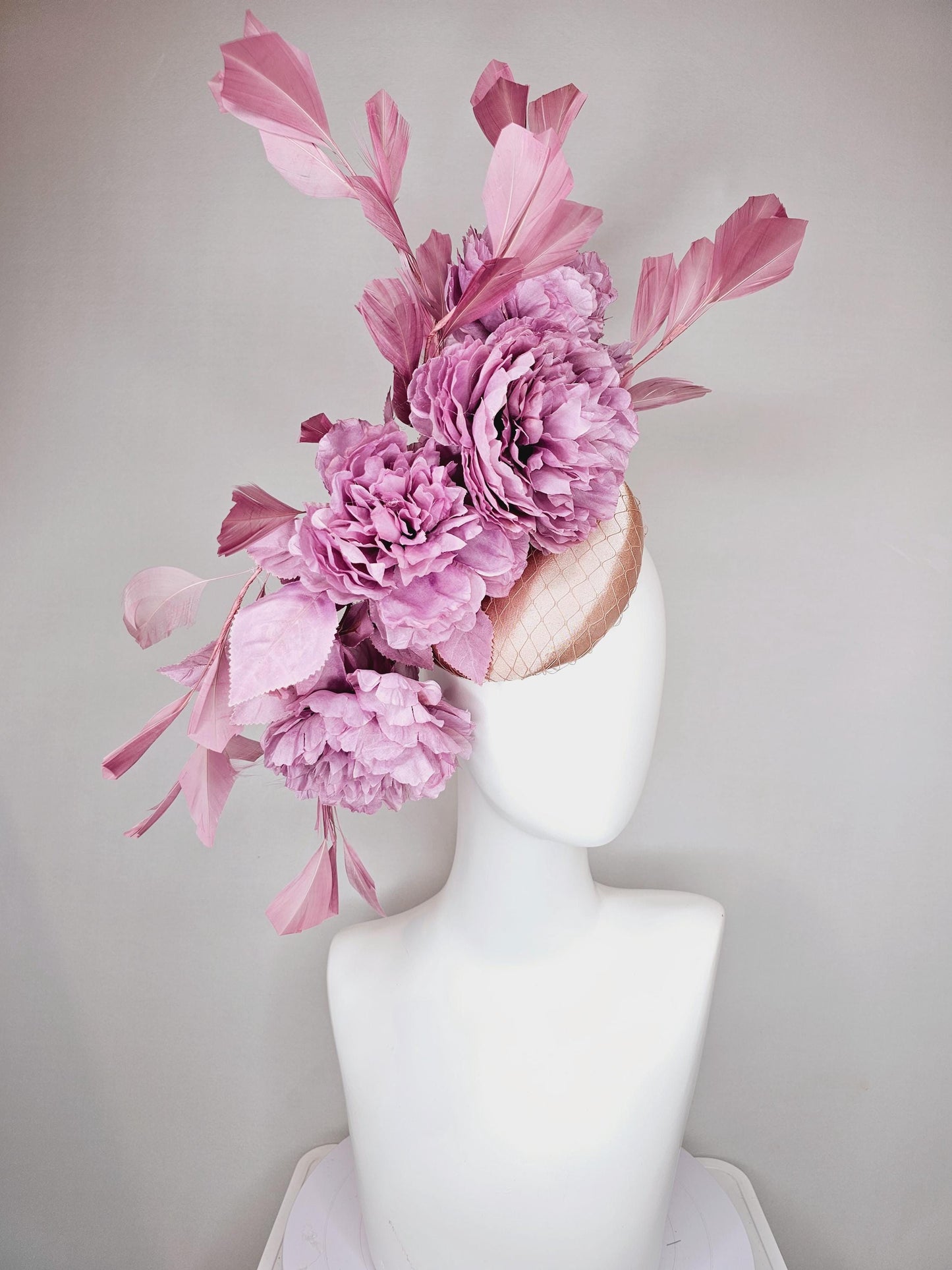 kentucky derby hat fascinator champagne pink satin with netting,light purple satin silk flowers and leaves,blush pink branching feathers
