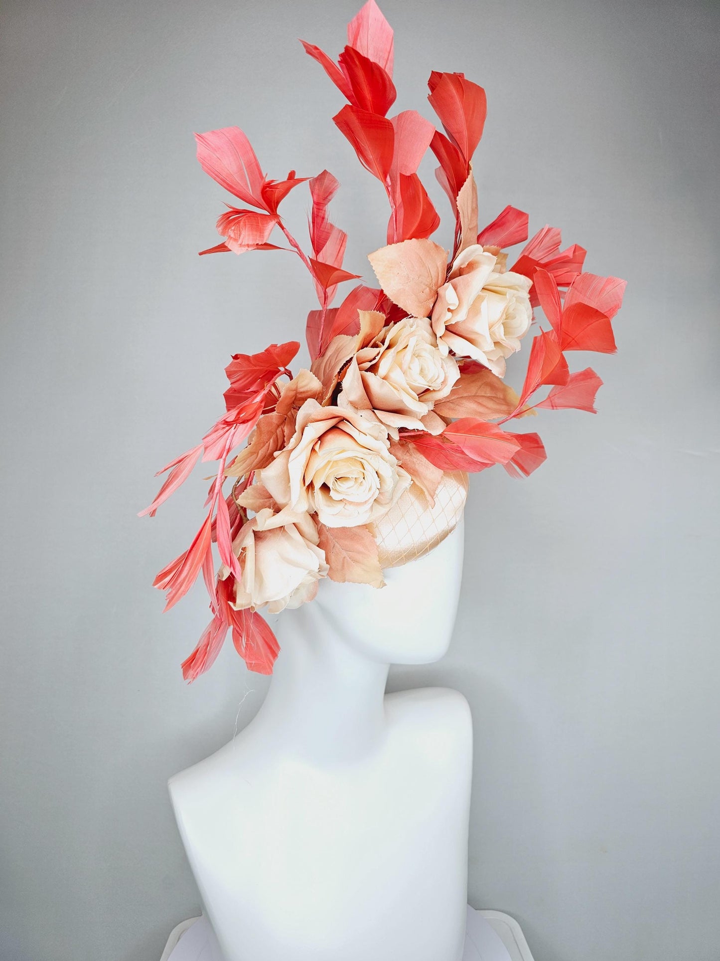 kentucky derby hat fascinator neutral champagne satin with netting,beige tan satin silk roses,beige leaves,coral orange branching feathers