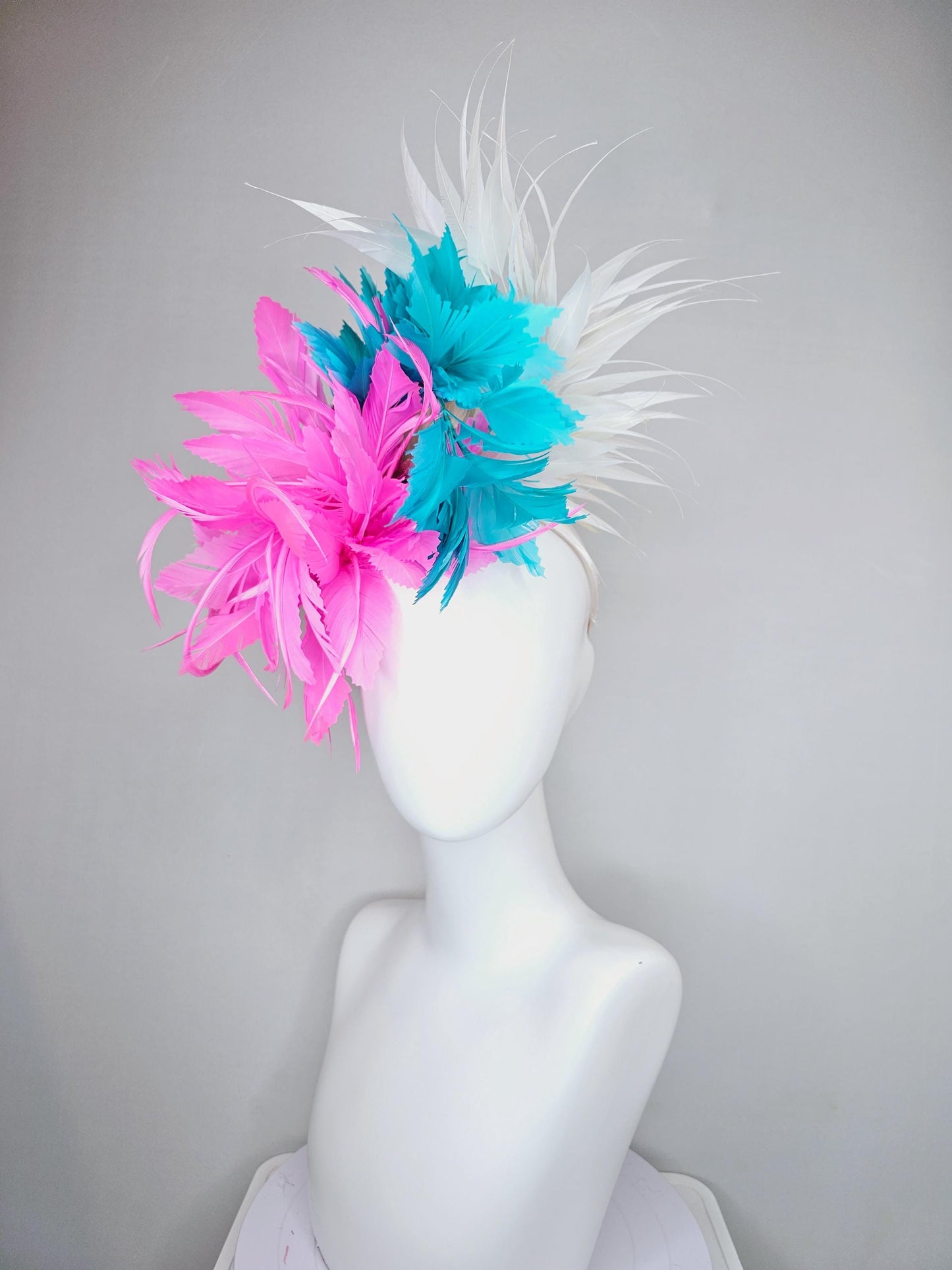 kentucky derby hat fascinator bright hot pink fluffy feather flower,turquoise blue branching feathers and white pointy feathers