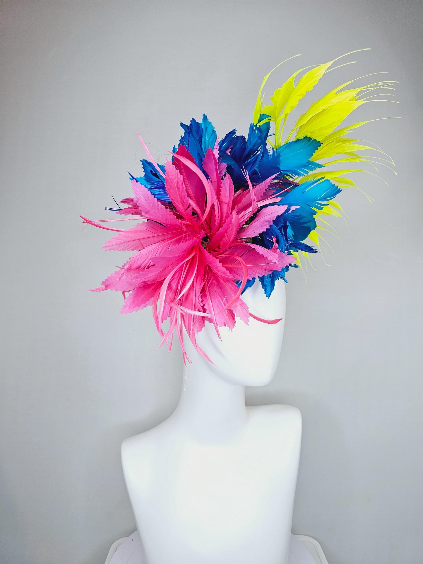 kentucky derby hat fascinator pink fluffy feather flower,royal blue branching zigzag feathers and bright yellow pointy feathers