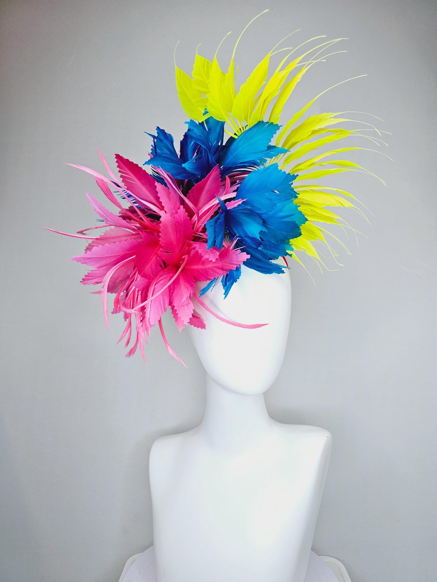 kentucky derby hat fascinator pink fluffy feather flower,royal blue branching zigzag feathers and bright yellow pointy feathers
