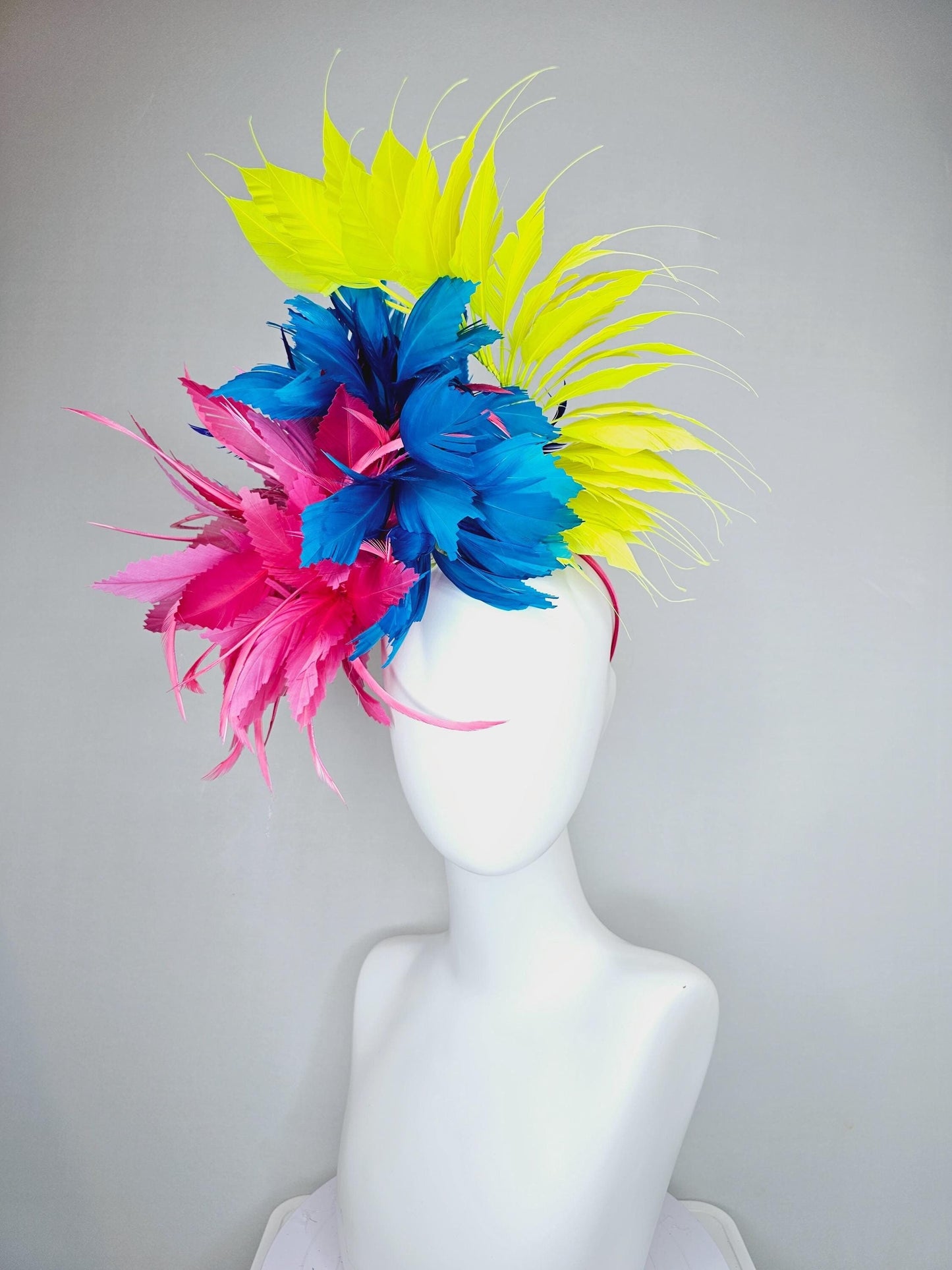 kentucky derby hat fascinator pink fluffy feather flower,royal blue branching zigzag feathers and bright yellow pointy feathers