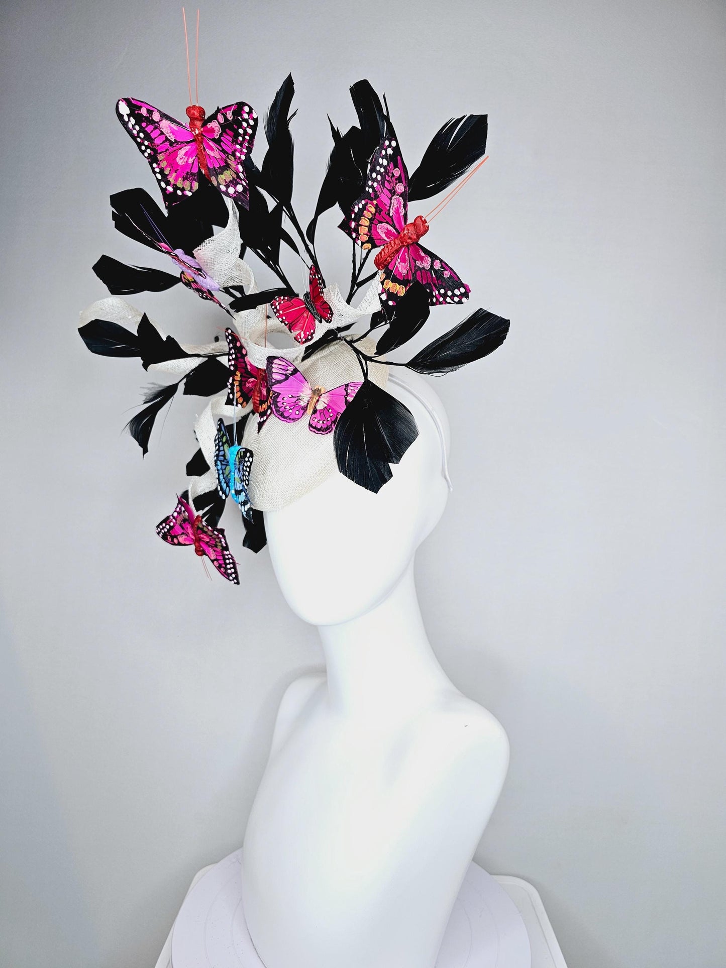 kentucky derby hat fascinator white sinamay with curls,black branching feathers,colorful rainbow pink,blue,purple,red painted butterflies