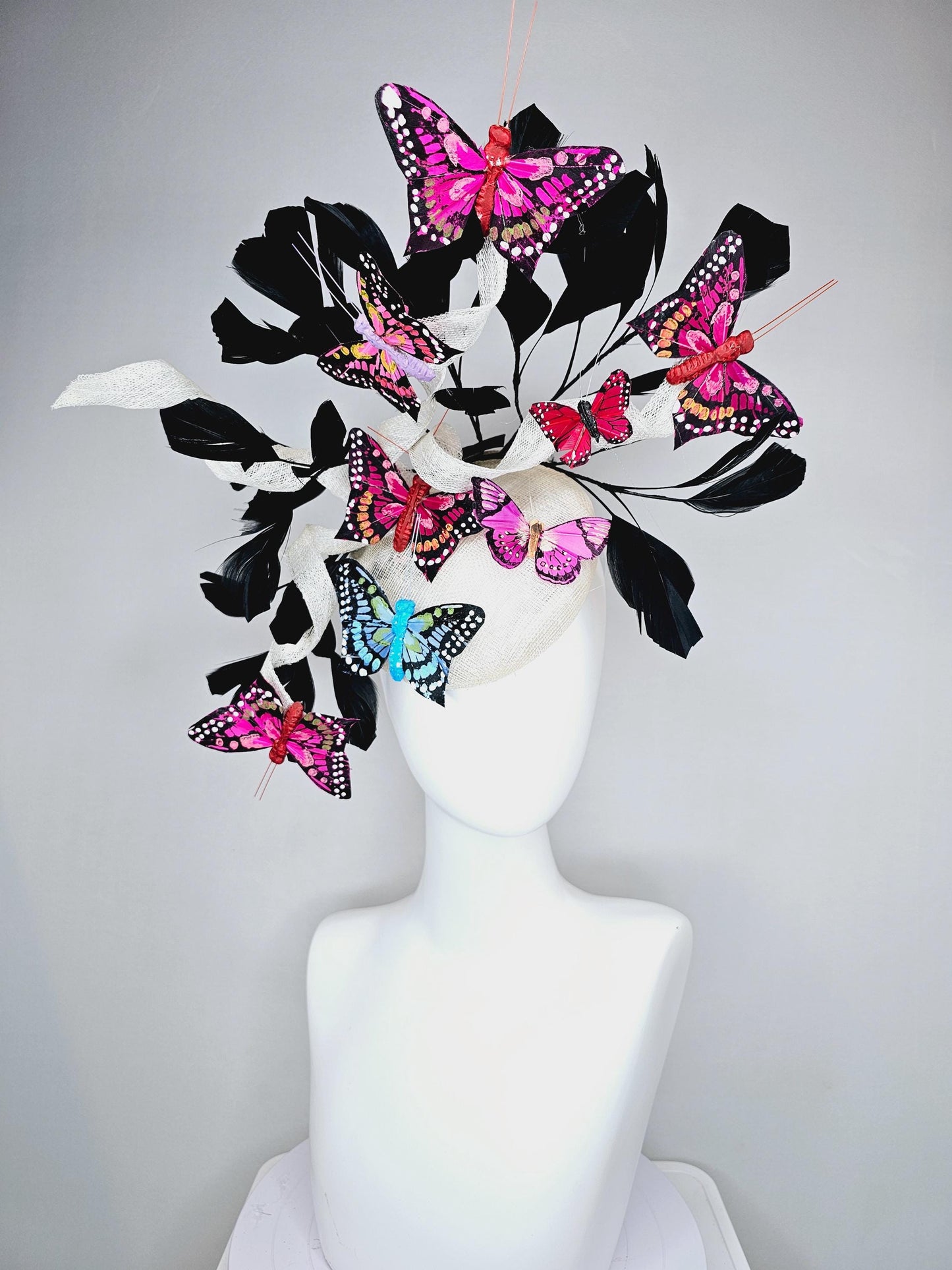kentucky derby hat fascinator white sinamay with curls,black branching feathers,colorful rainbow pink,blue,purple,red painted butterflies