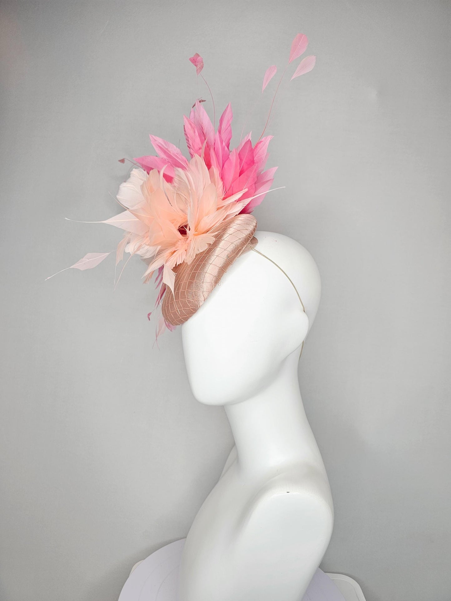 kentucky derby hat fascinator light pink champagne satin with netting,pink branching feathers and light blush pink feather flower