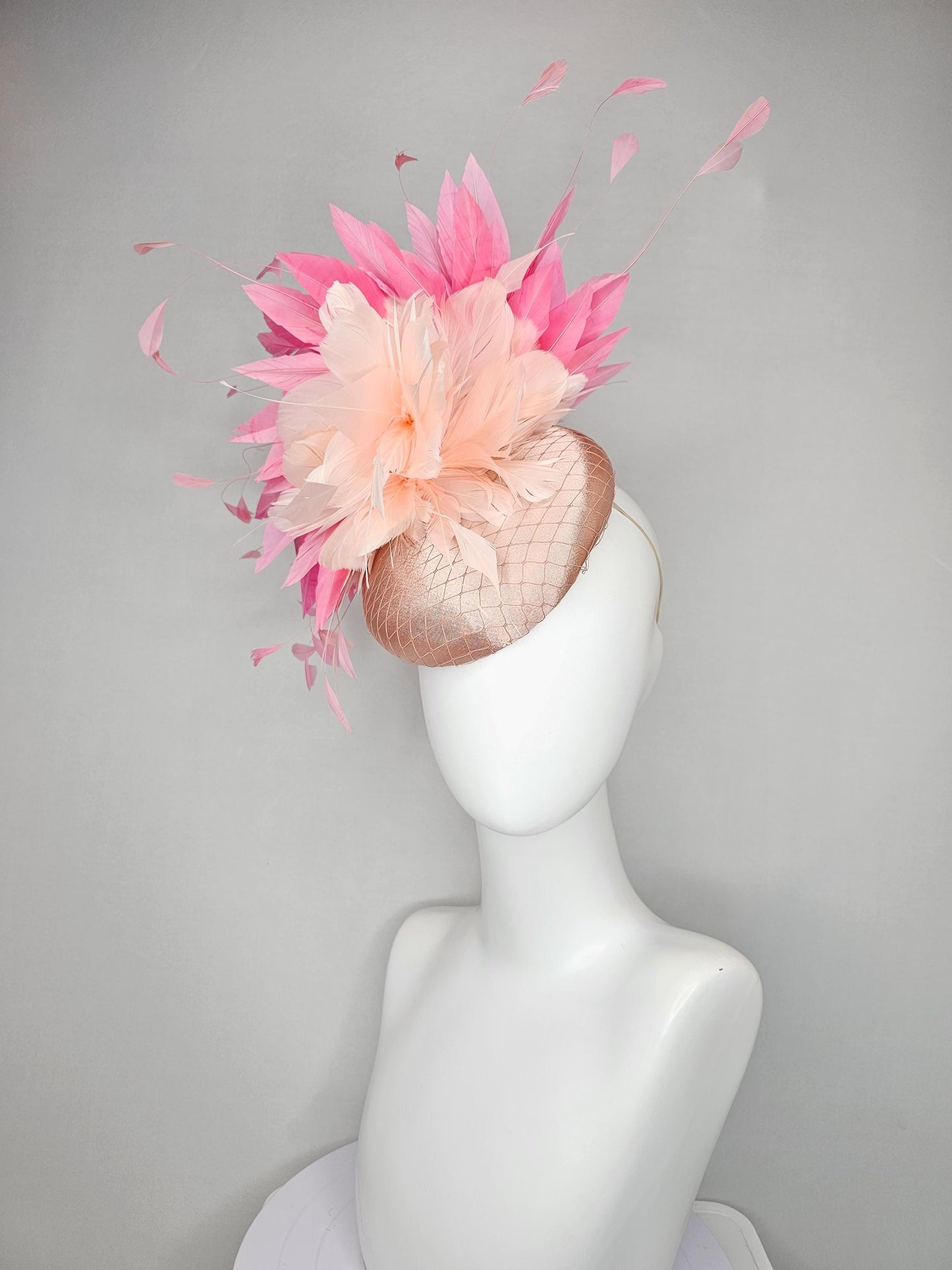 kentucky derby hat fascinator light pink champagne satin with netting,pink branching feathers and light blush pink feather flower