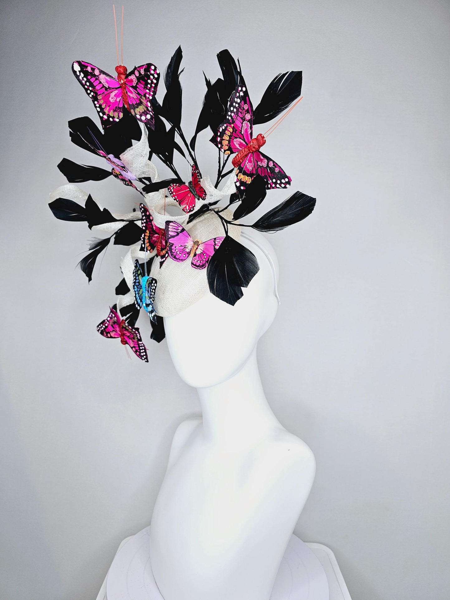 kentucky derby hat fascinator white sinamay with curls,black branching feathers,colorful rainbow pink,blue,purple,red painted butterflies