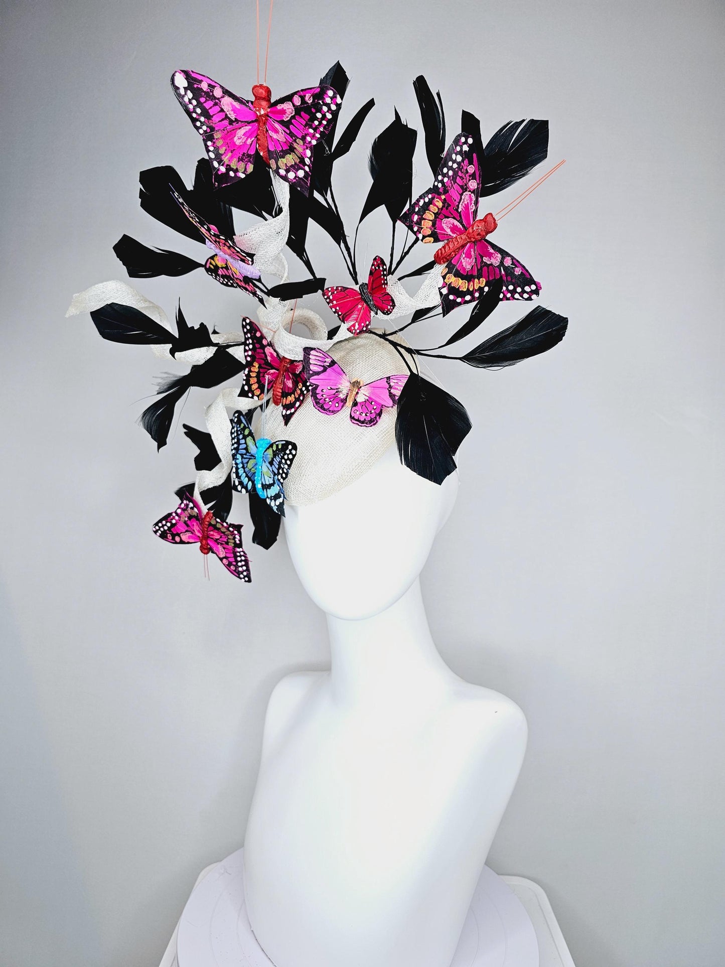 kentucky derby hat fascinator white sinamay with curls,black branching feathers,colorful rainbow pink,blue,purple,red painted butterflies