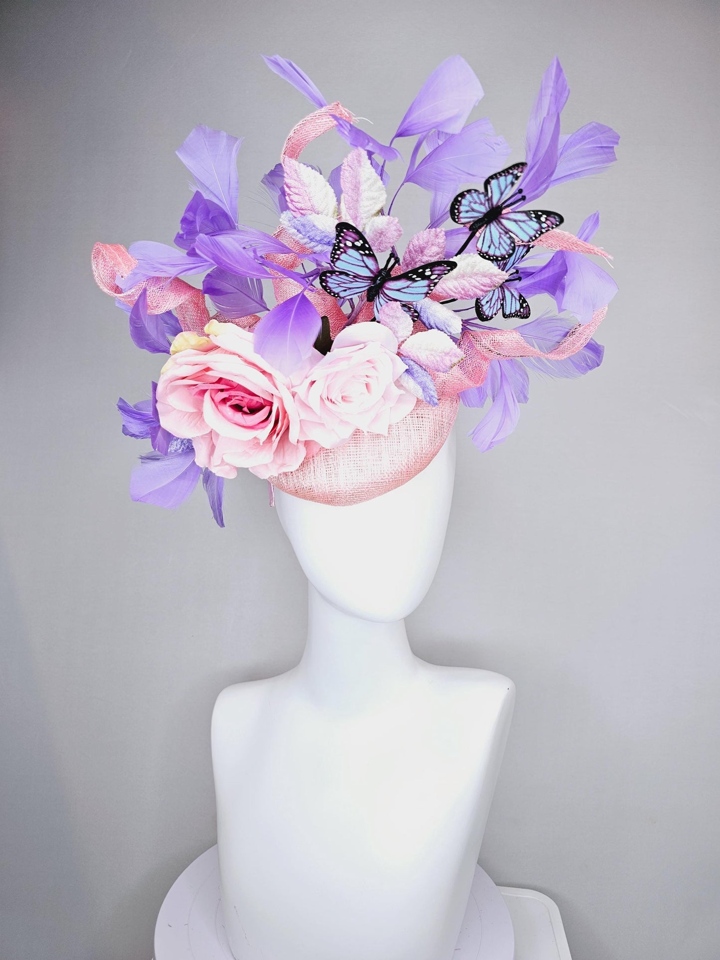kentucky derby hat fascinator blush pink sinamay w/curls,light pink satin roses,pink purple leaves,lavender purple feathers,blue butterflies