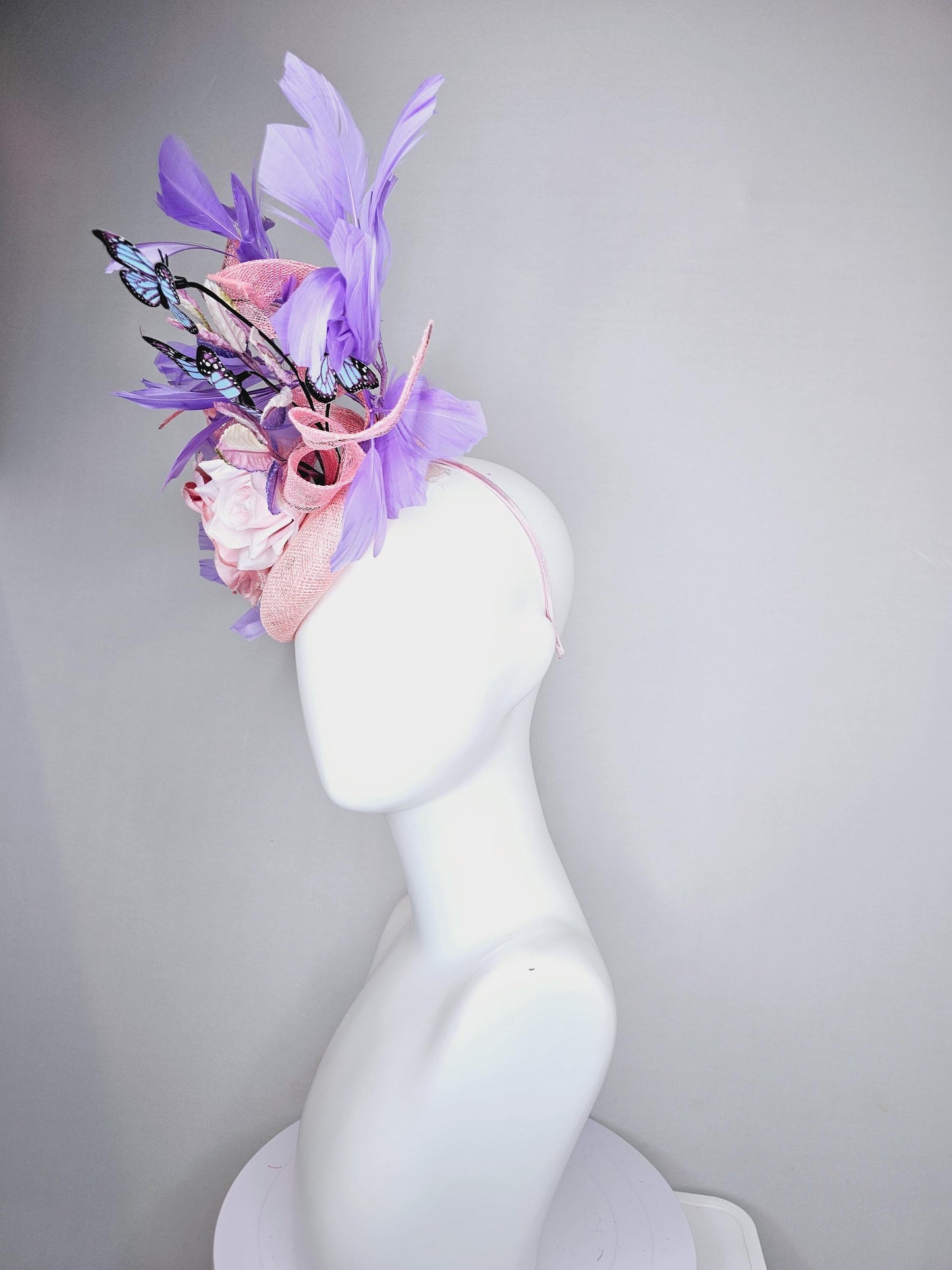 kentucky derby hat fascinator blush pink sinamay w/curls,light pink satin roses,pink purple leaves,lavender purple feathers,blue butterflies
