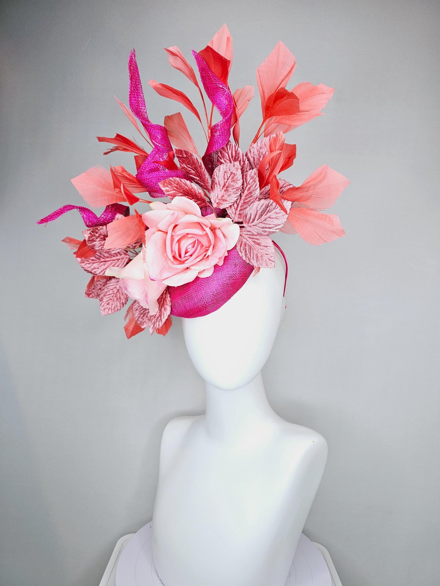 kentucky derby hat fascinator fuchsia pink sinamay with curls, light pink satin roses, dusty pink leaves, coral orange branching feathers