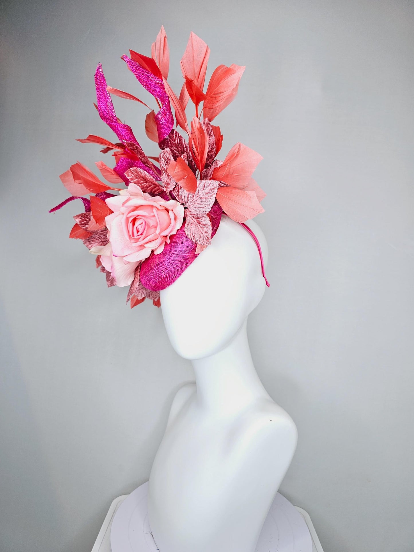 kentucky derby hat fascinator fuchsia pink sinamay with curls, light pink satin roses, dusty pink leaves, coral orange branching feathers