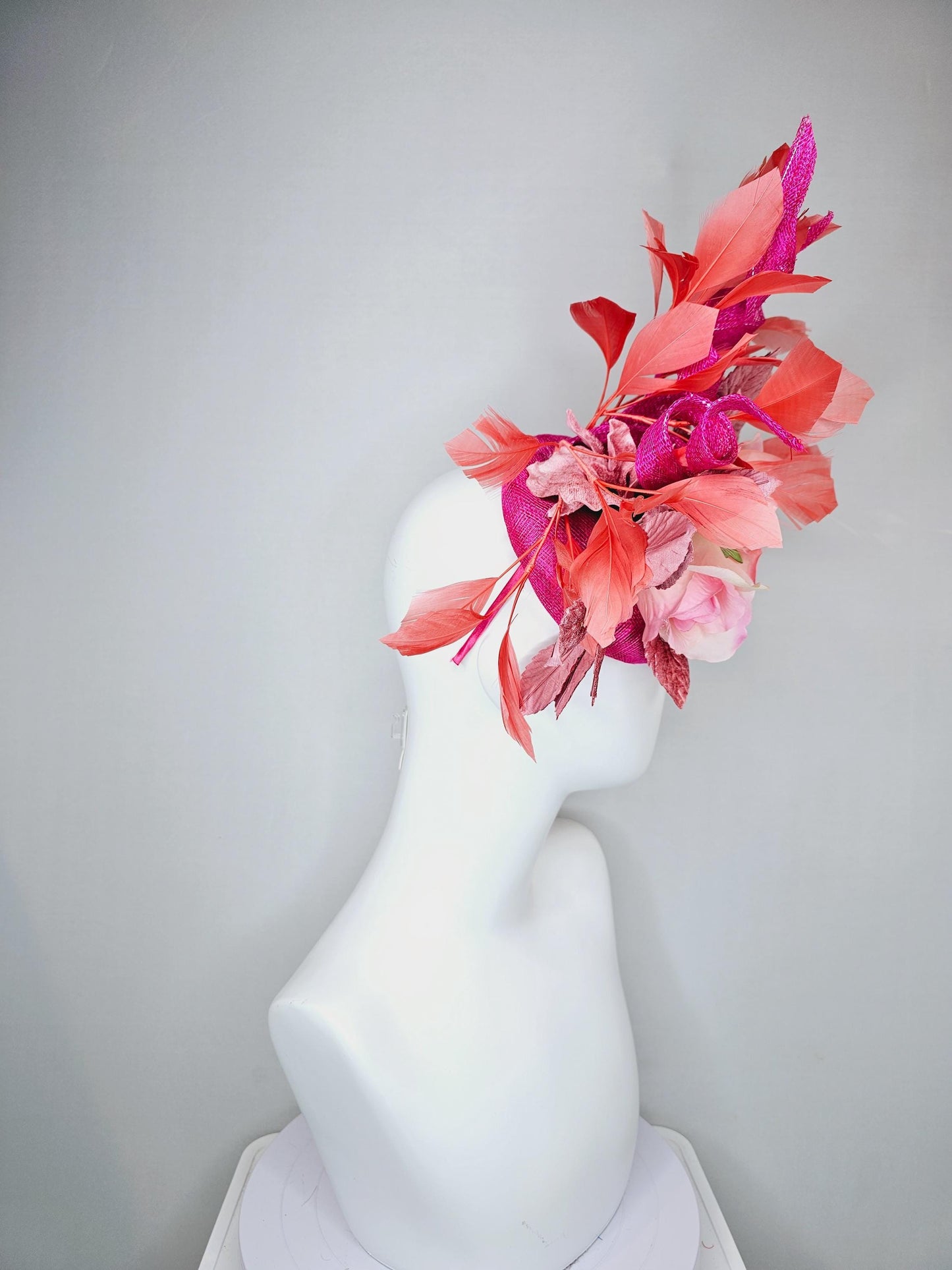 kentucky derby hat fascinator fuchsia pink sinamay with curls, light pink satin roses, dusty pink leaves, coral orange branching feathers