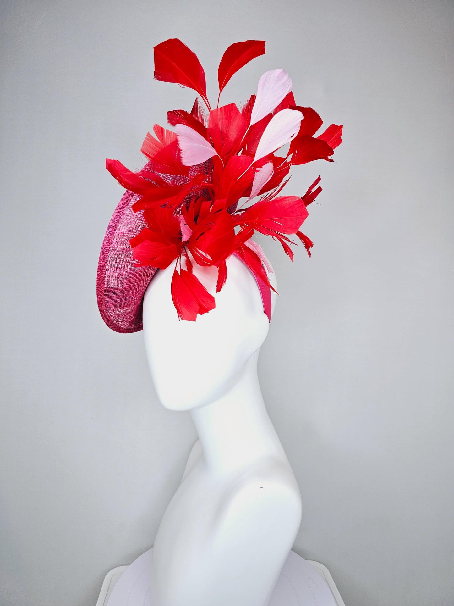 kentucky derby hat fascinator raspberry pink sinamay saucer with red pink blue green floral embroidered, scarlet red and light pink feathers