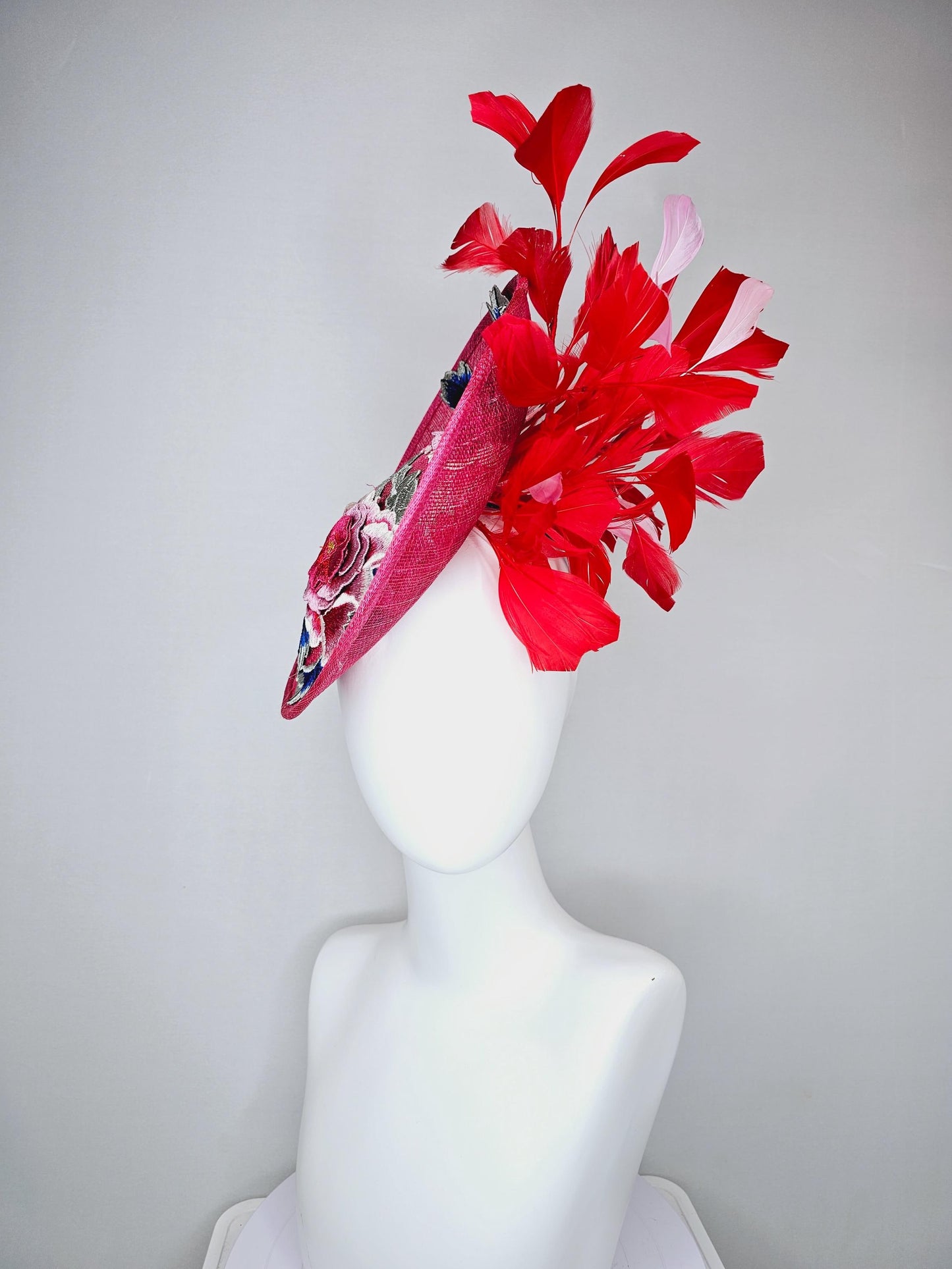 kentucky derby hat fascinator raspberry pink sinamay saucer with red pink blue green floral embroidered, scarlet red and light pink feathers