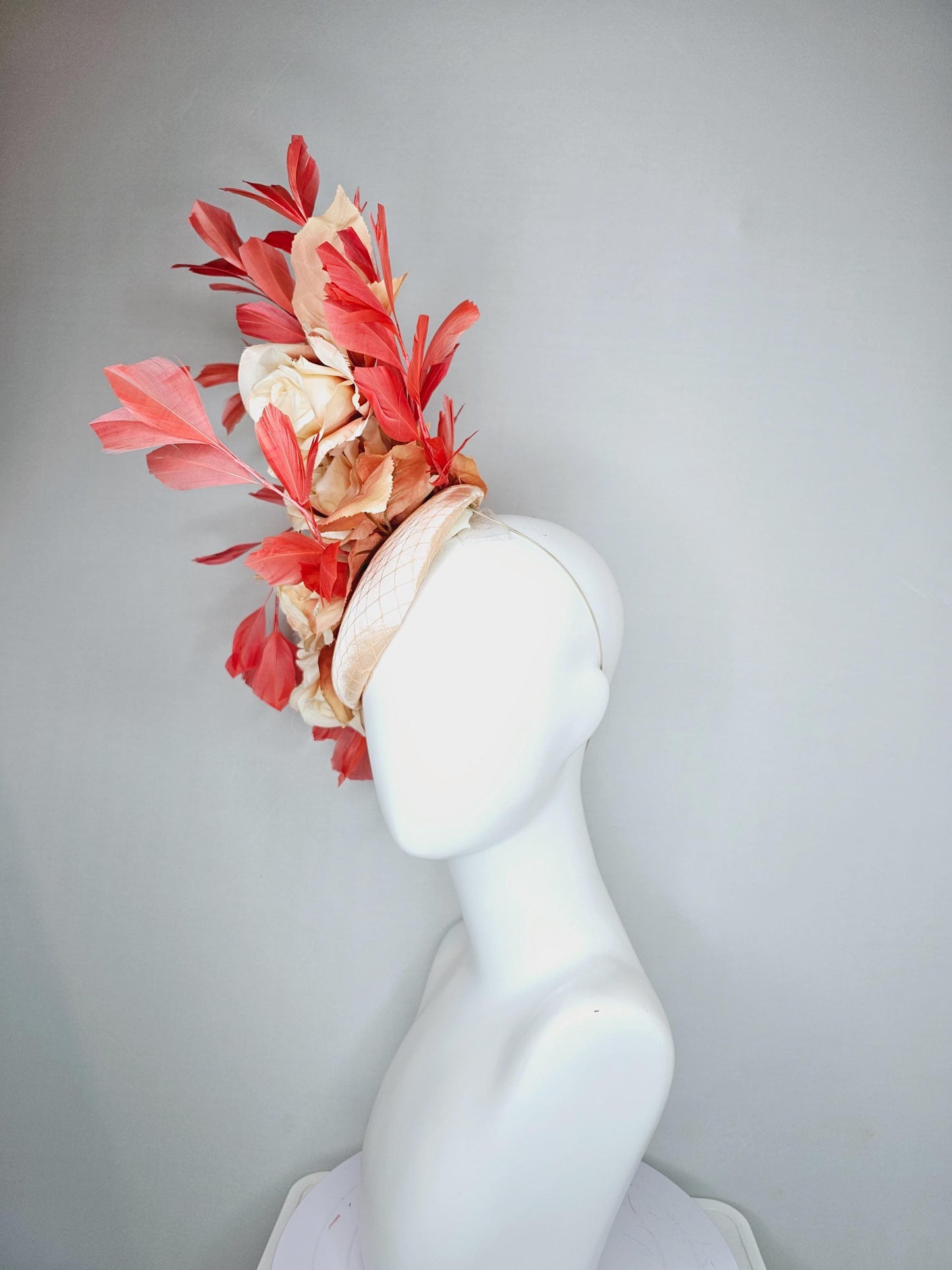 kentucky derby hat fascinator neutral champagne satin with netting,beige tan satin silk roses,beige leaves,coral orange branching feathers