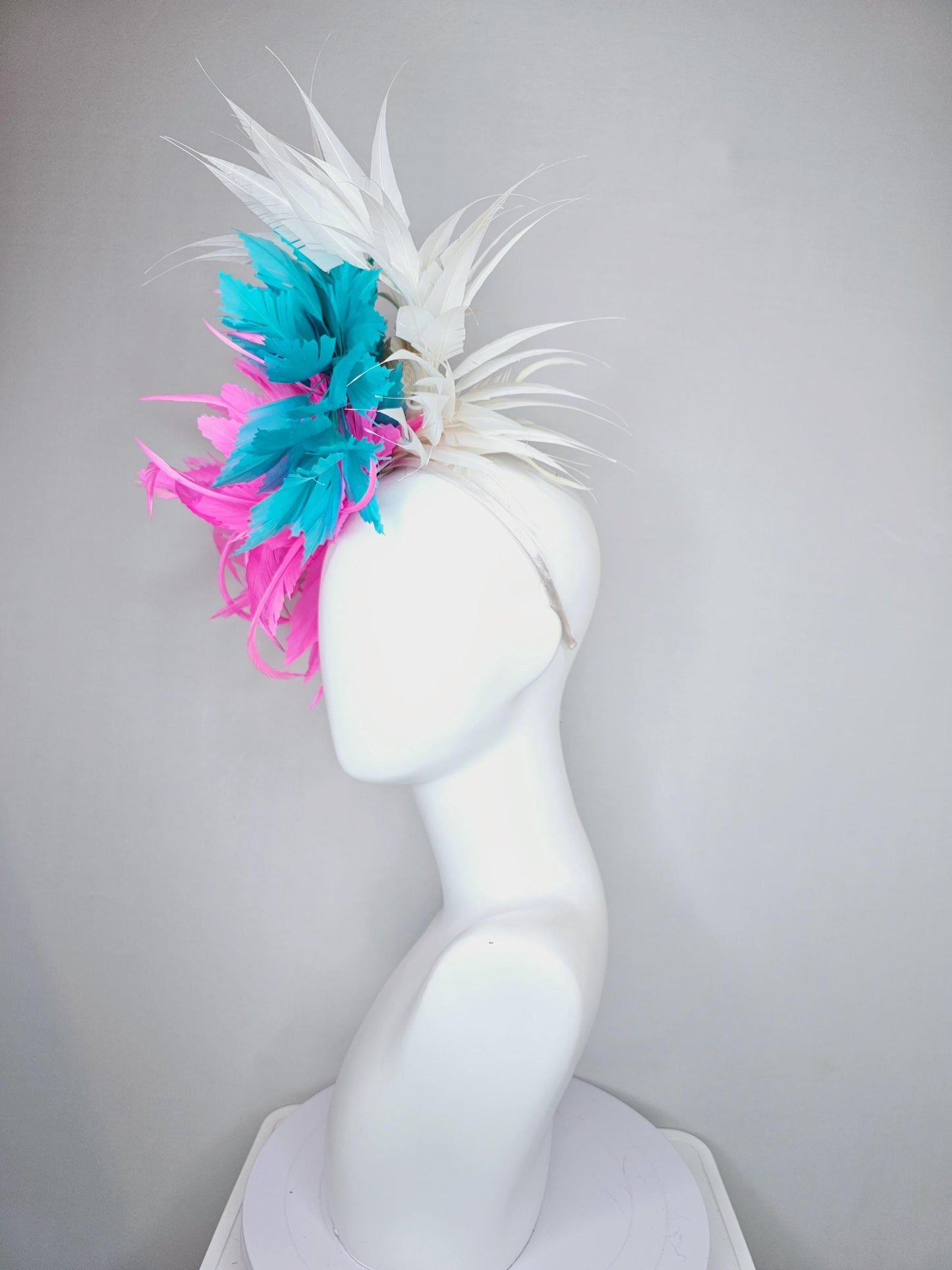 kentucky derby hat fascinator bright hot pink fluffy feather flower,turquoise blue branching feathers and white pointy feathers
