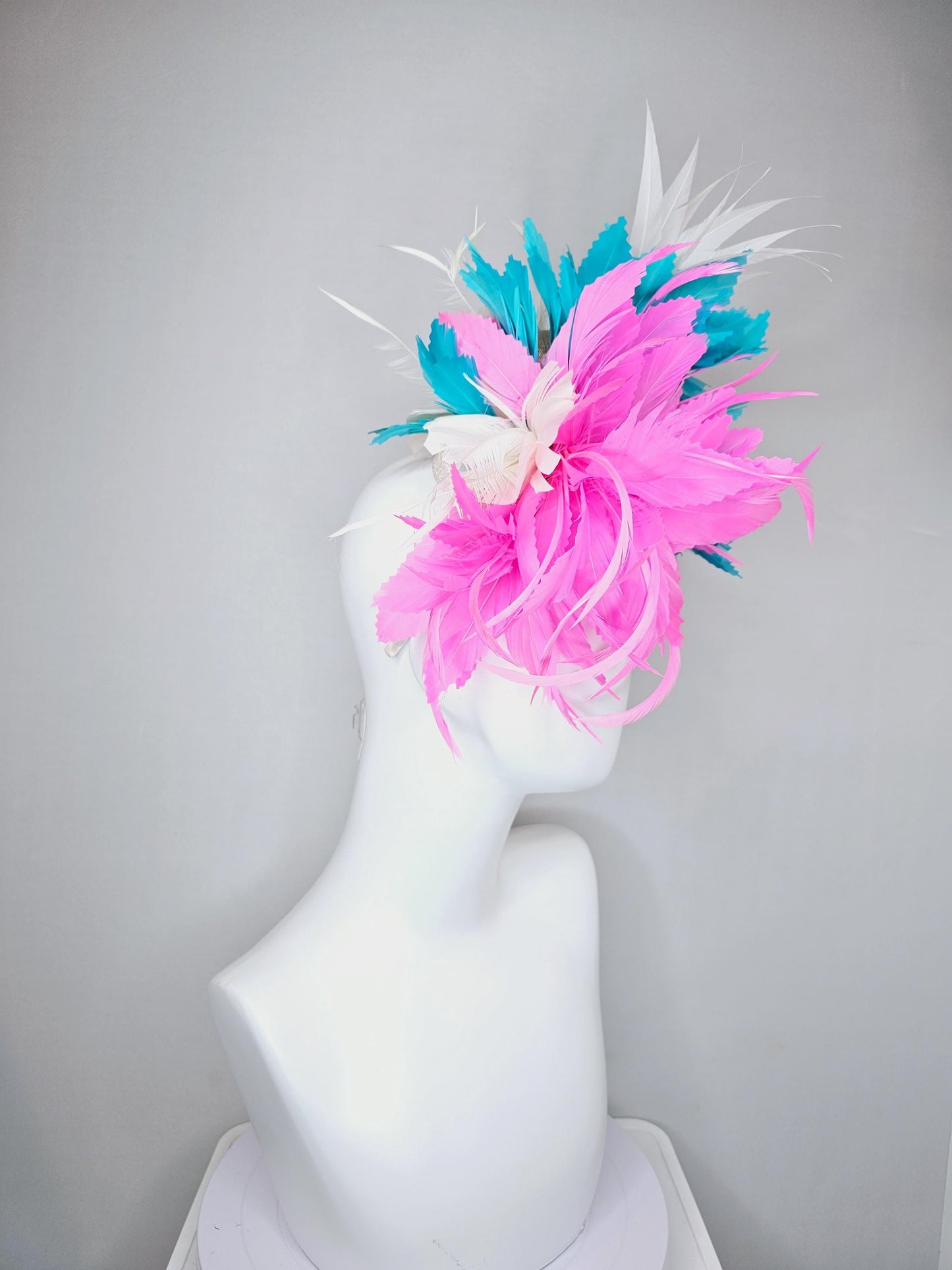 kentucky derby hat fascinator bright hot pink fluffy feather flower,turquoise blue branching feathers and white pointy feathers