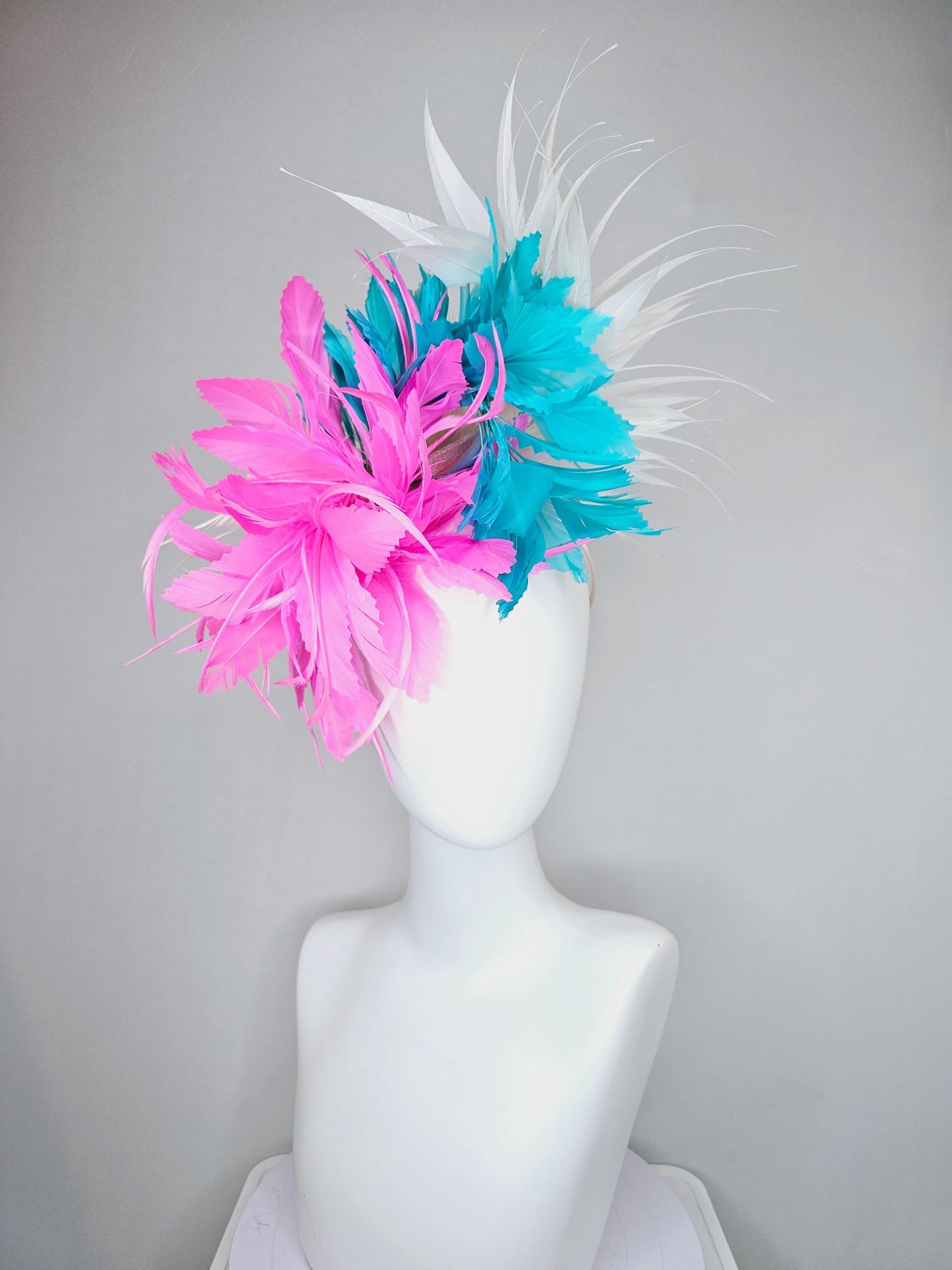 kentucky derby hat fascinator bright hot pink fluffy feather flower,turquoise blue branching feathers and white pointy feathers