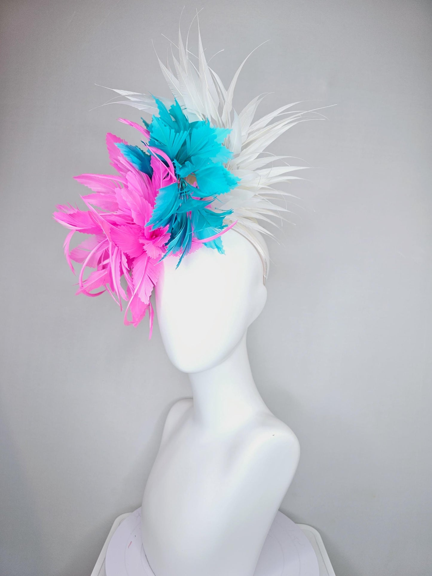 kentucky derby hat fascinator bright hot pink fluffy feather flower,turquoise blue branching feathers and white pointy feathers