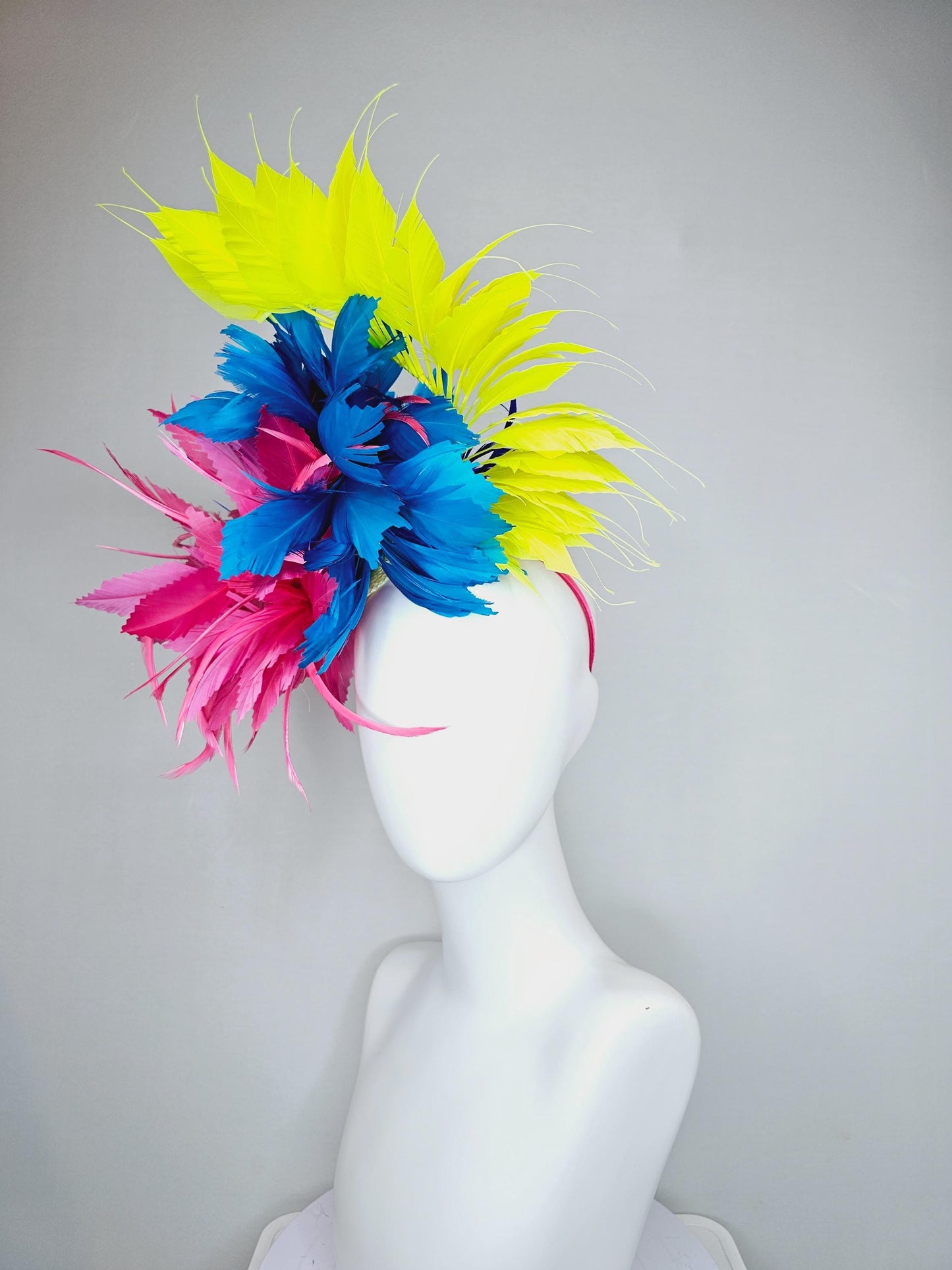 kentucky derby hat fascinator pink fluffy feather flower,royal blue branching zigzag feathers and bright yellow pointy feathers