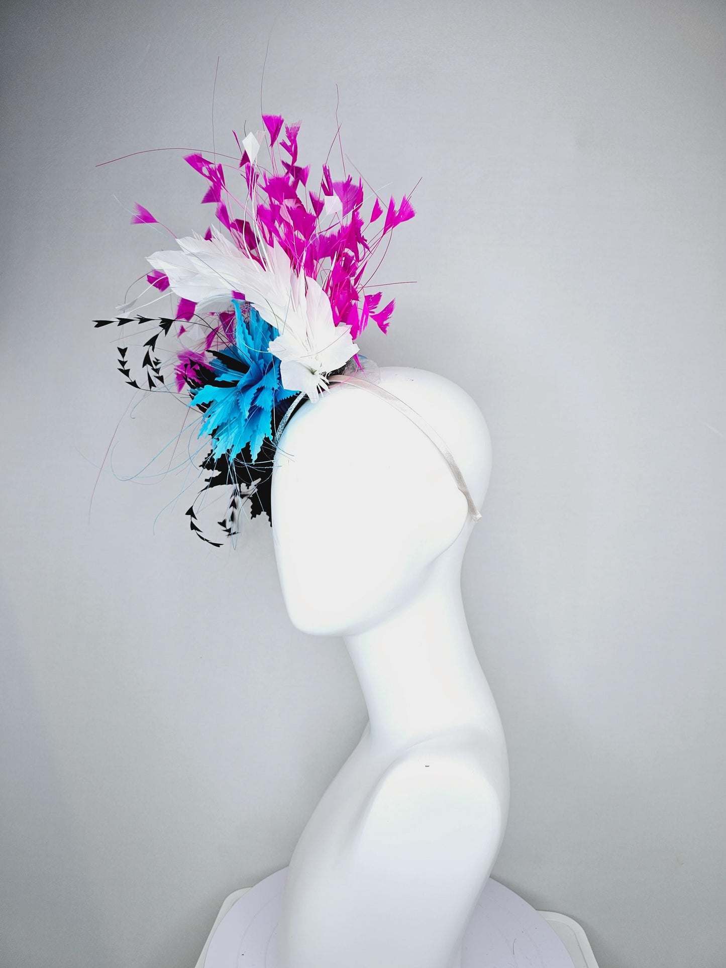 kentucky derby hat fascinator colorful zigzag sky turquoise blue and black feather flowers with white and fuchsia pink branching feathers