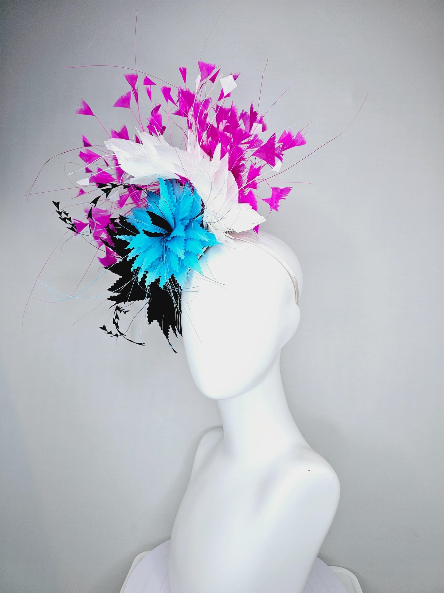 kentucky derby hat fascinator colorful zigzag sky turquoise blue and black feather flowers with white and fuchsia pink branching feathers
