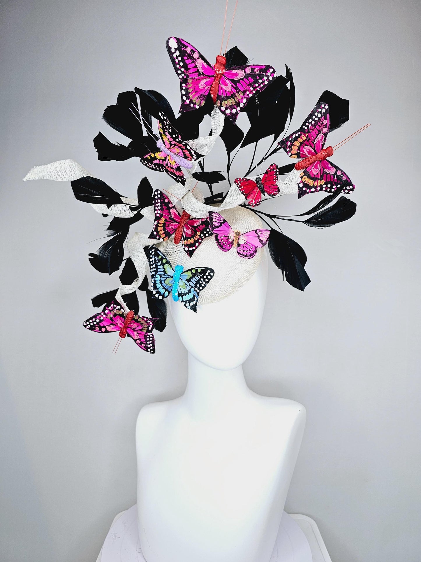 kentucky derby hat fascinator white sinamay with curls,black branching feathers,colorful rainbow pink,blue,purple,red painted butterflies