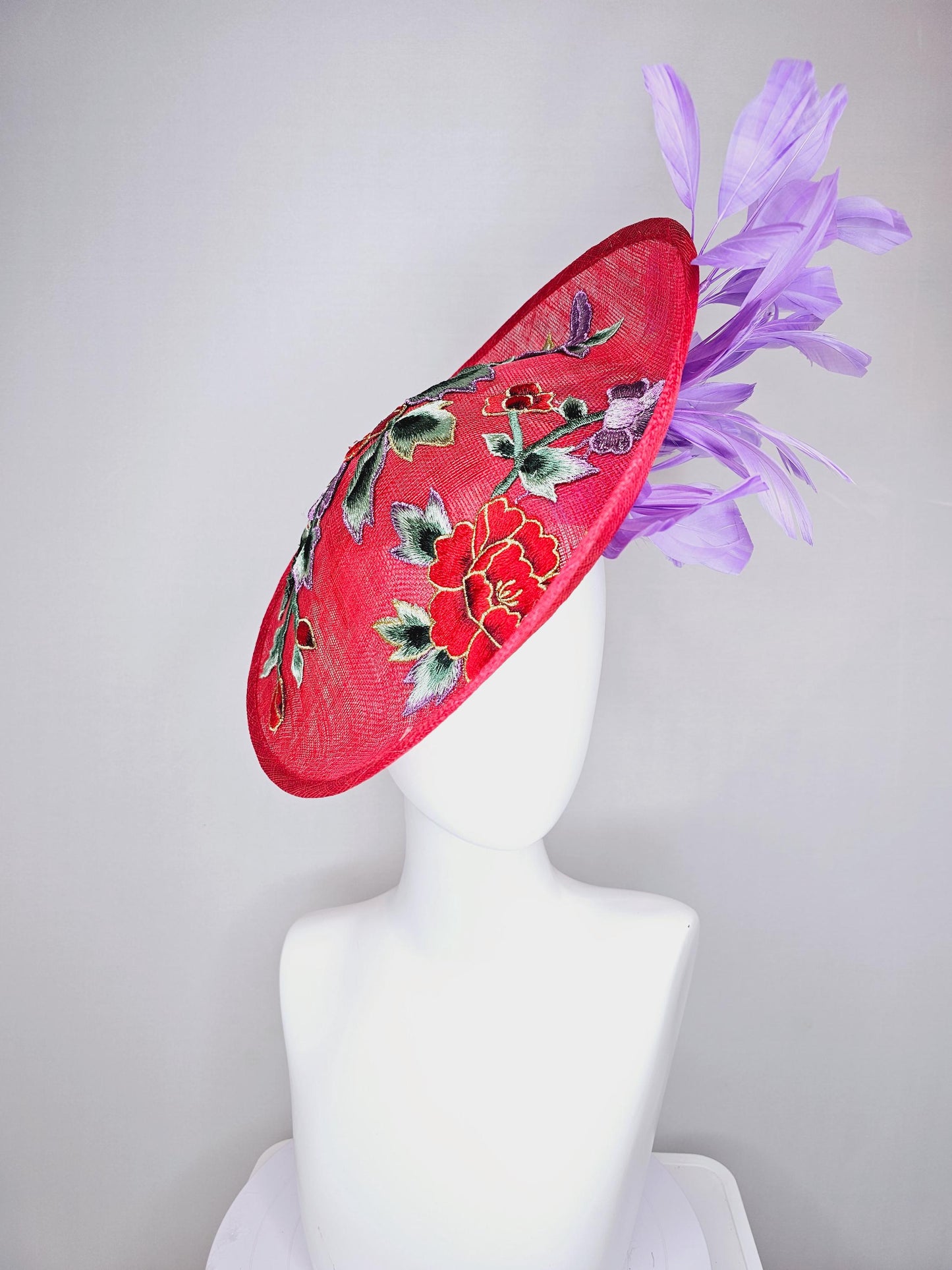 kentucky derby hat fascinator red sinamay saucer with red purple gold green embroidered flowers and lavender purple branching feathers