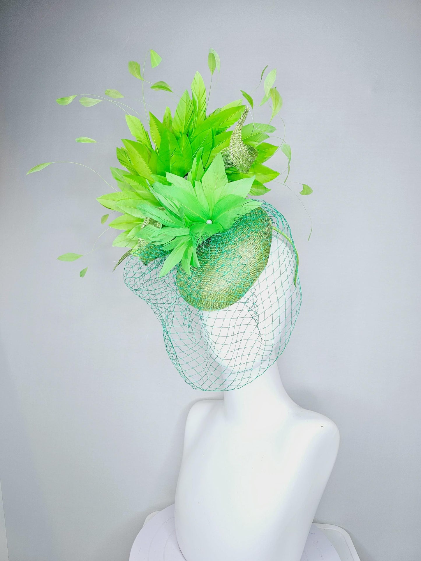 kentucky derby hat fascinator lime green sinamay with sinamay curls bright green feather flower lime green feathers with green mesh veil