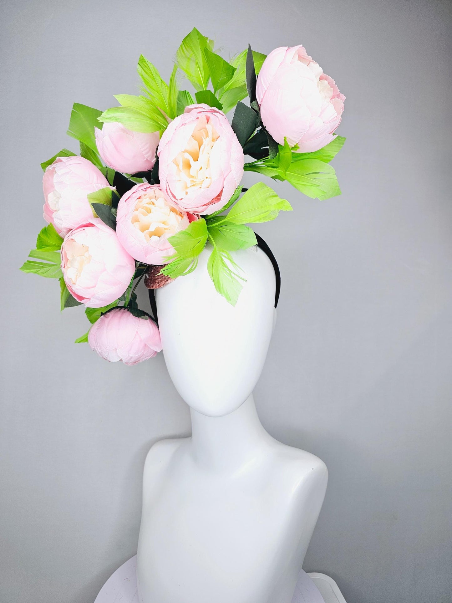 kentucky derby hat fascinator large blush pink flowers with green branching feathers large headpiece