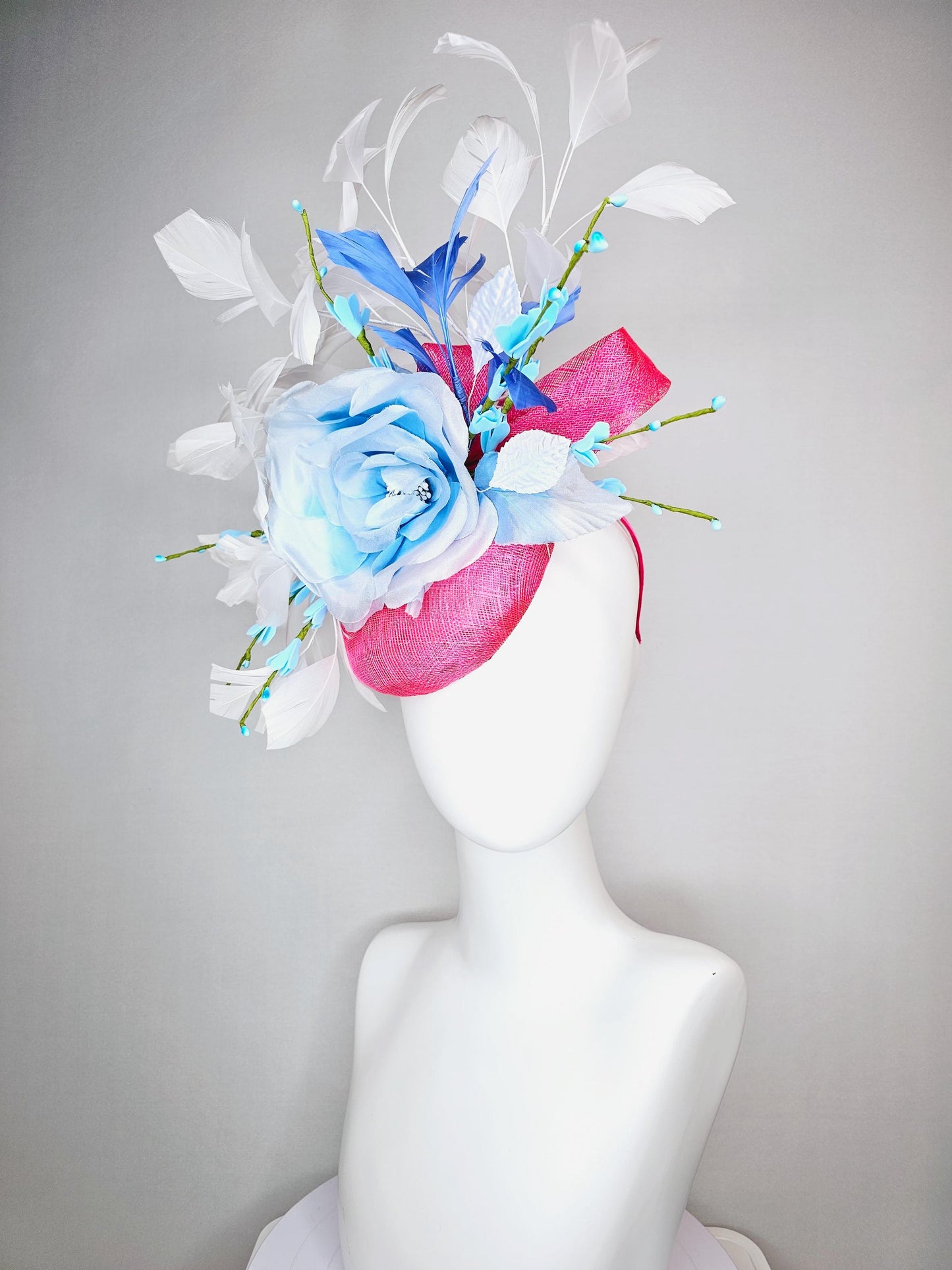 kentucky derby hat fascinator raspberry pink sinamay with sinamay bows and ombre blue organza rose flower and white and royal blue feathers