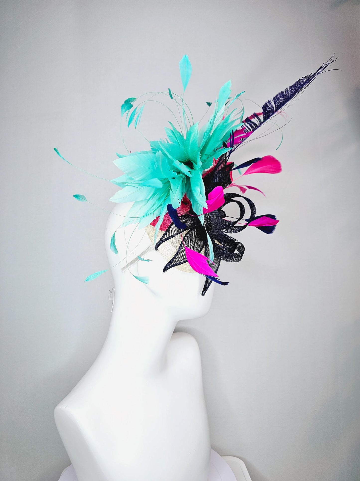 kentucky derby hat fascinator ivory white sinamay with navy blue raspberry pink sinamay flower and aqua green branching feathers