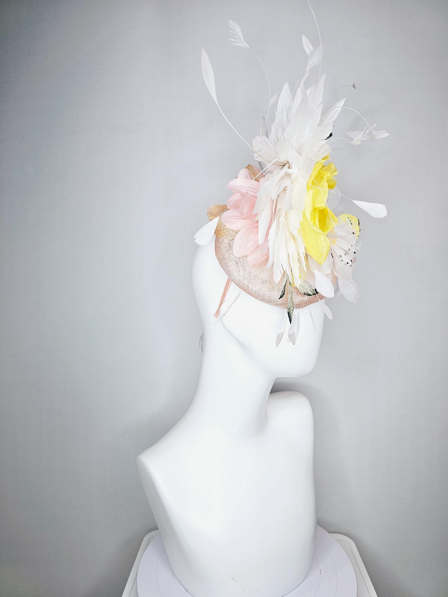 kentucky derby hat fascinator champagne pink sinamay yellow satin white organza flowers ombre green leaves white butterfly white feathers
