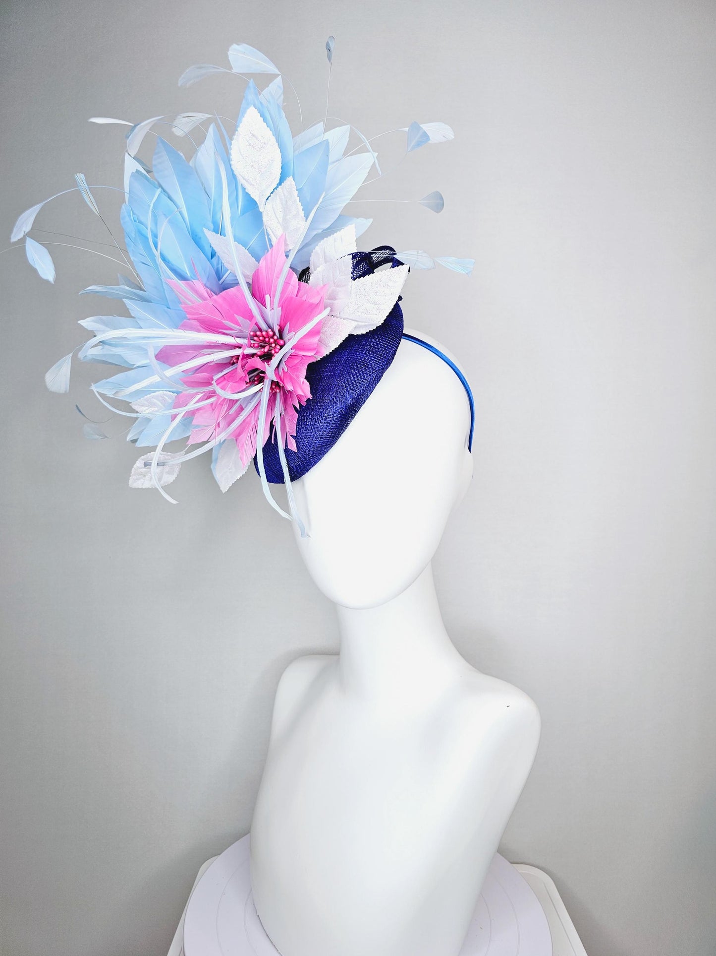 kentucky derby hat fascinator royal blue sinamay with blush pink feather flower and white leaves light baby blue branching feathers