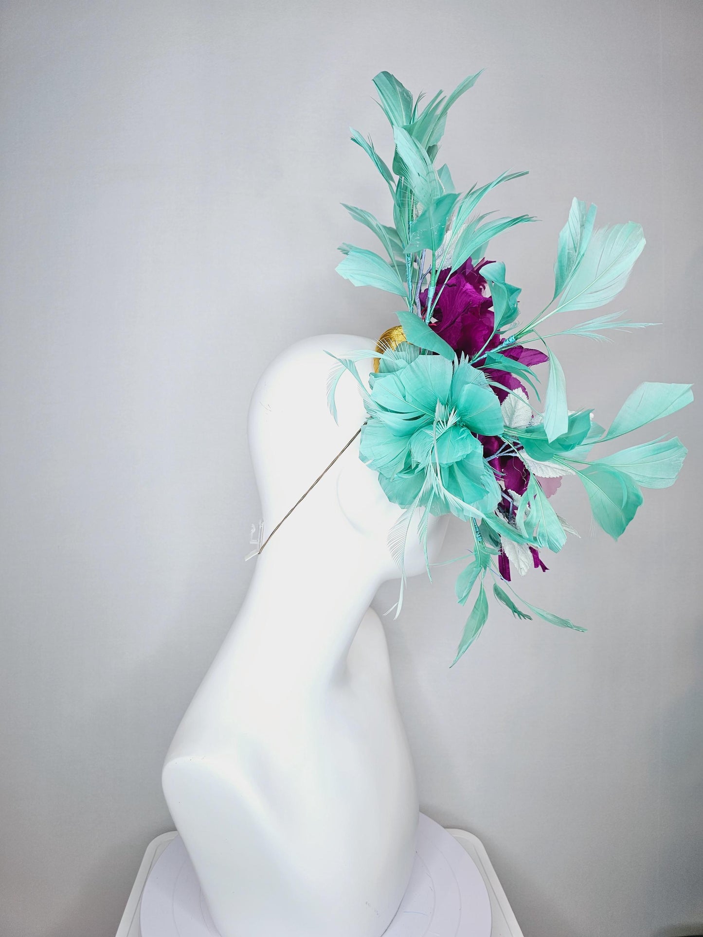 kentucky derby hat fascinator yellow gold satin with netting fuchsia pink organza satin flowers ombre blue leaves mint green feathers