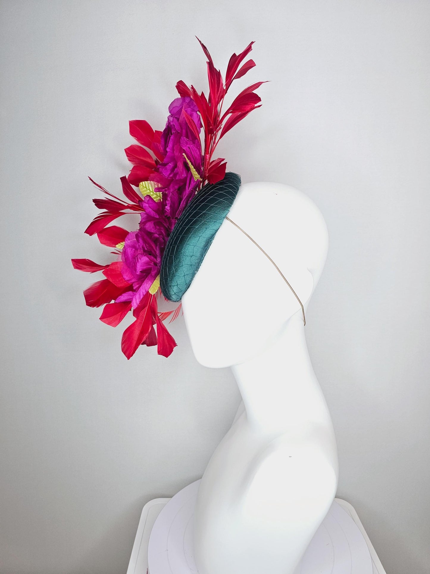 kentucky derby hat fascinator emerald green satin with netting and fuchsia pink satin flowers yellow leaves cherry red branching feathers